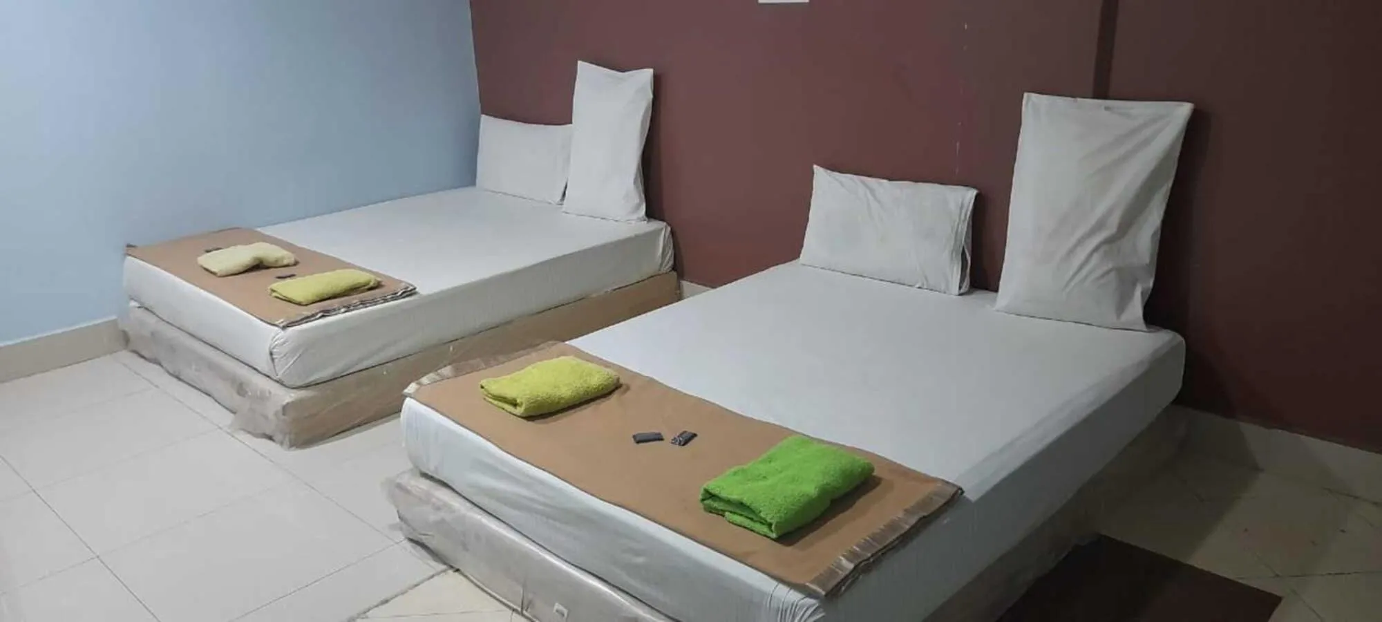 towels, Bed in SV Andalas Hotel