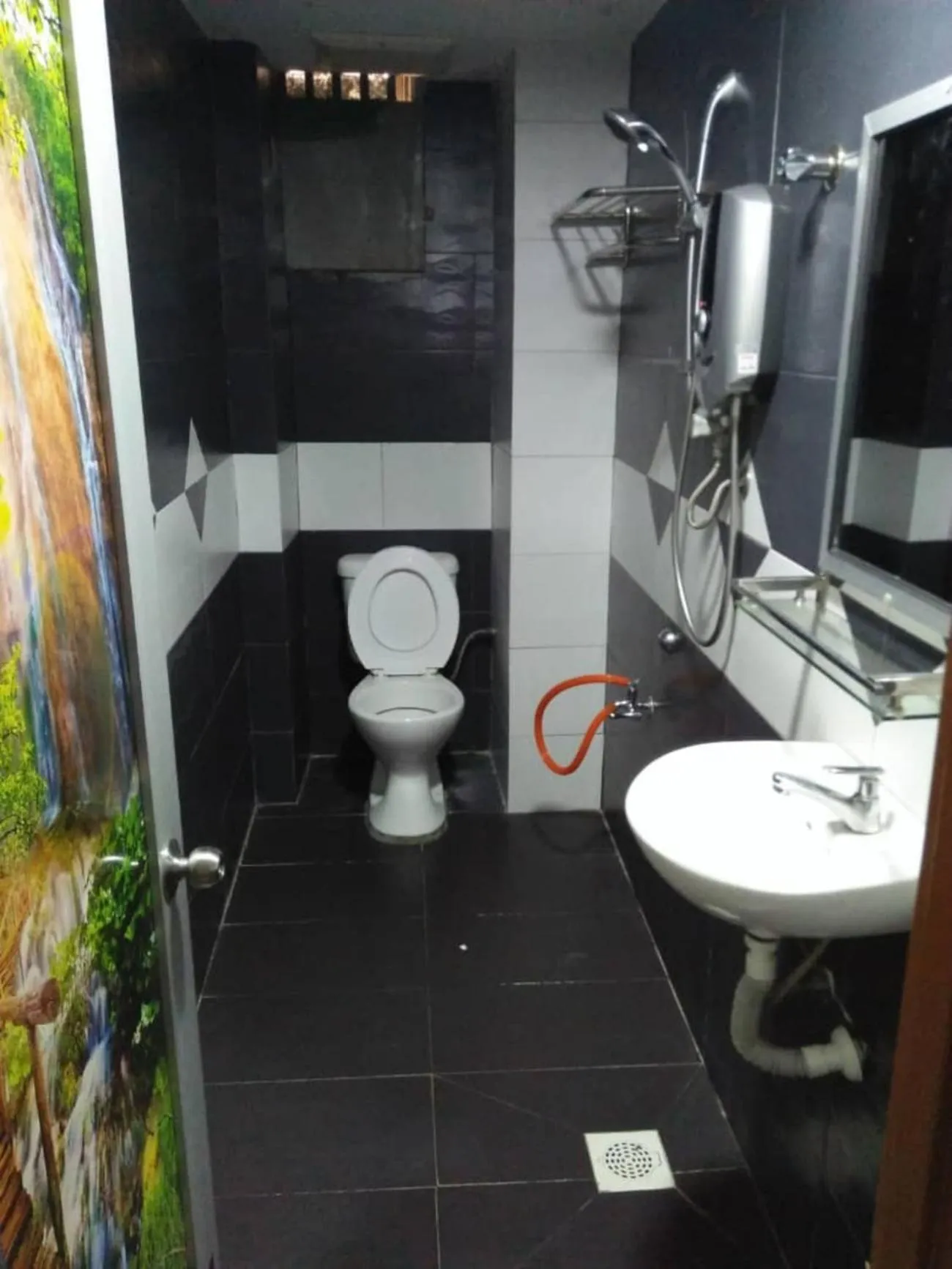 Bathroom in SV Andalas Hotel