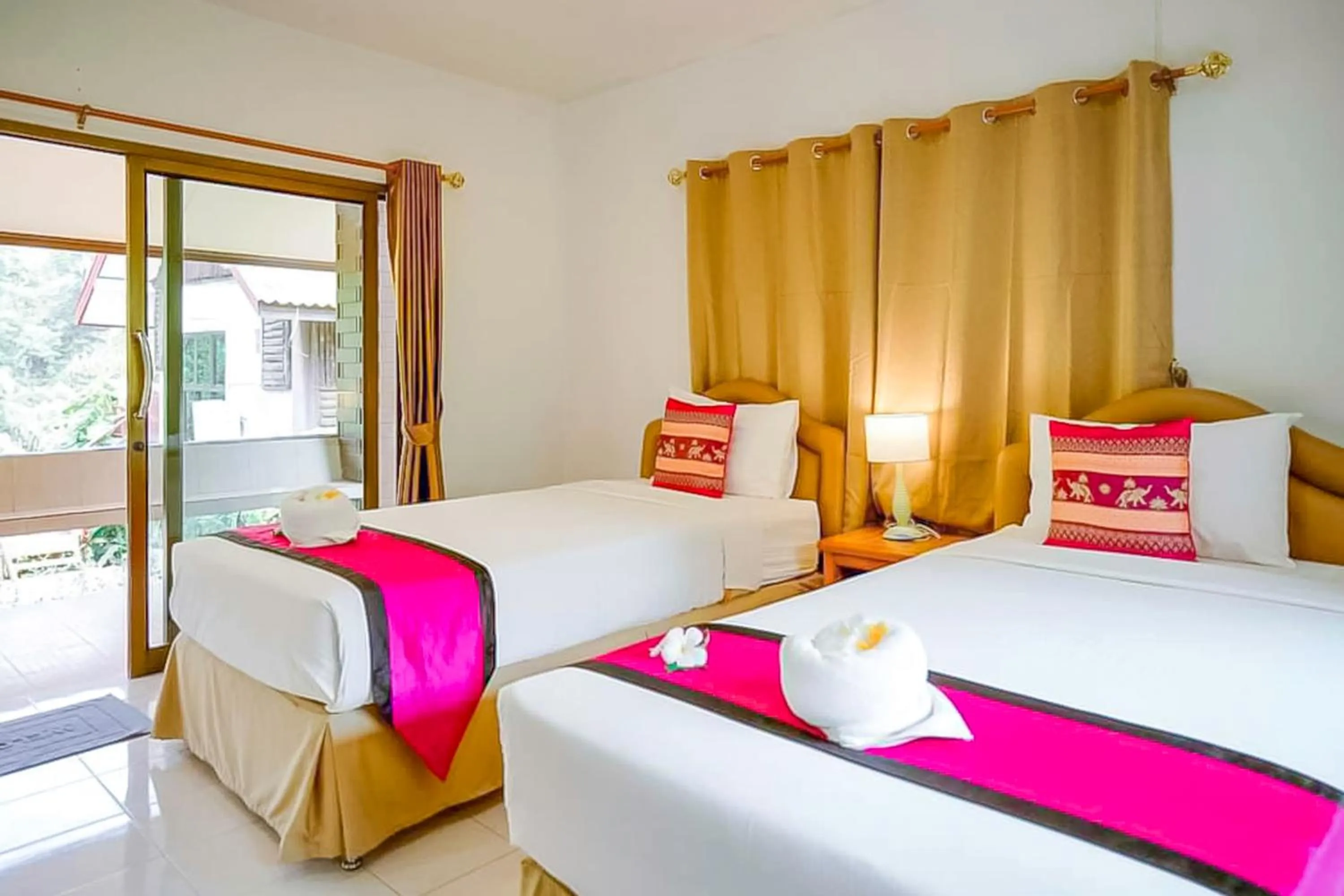 Bed in Saitharn Iyara Resort