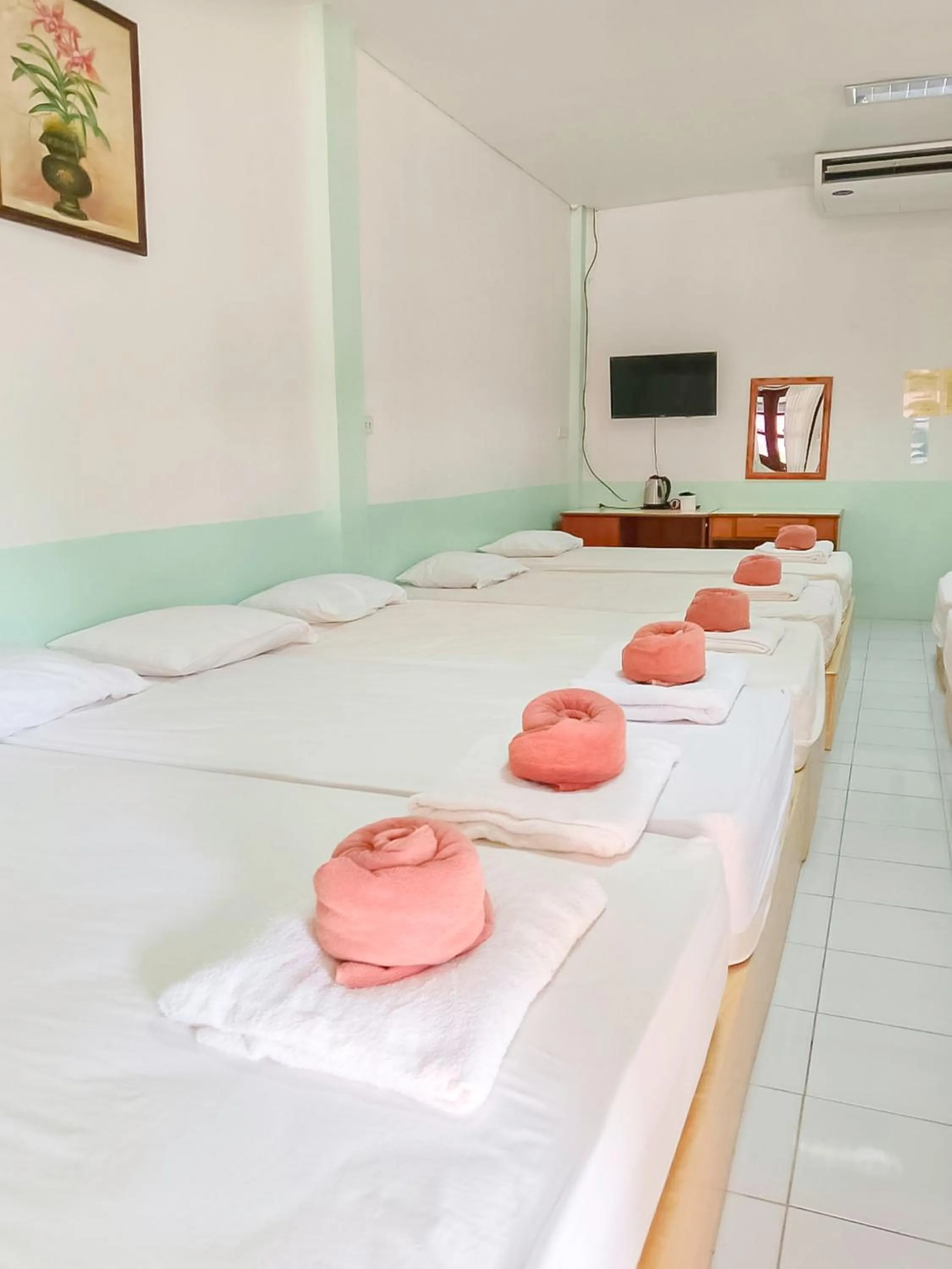 Bed in Saitharn Iyara Resort