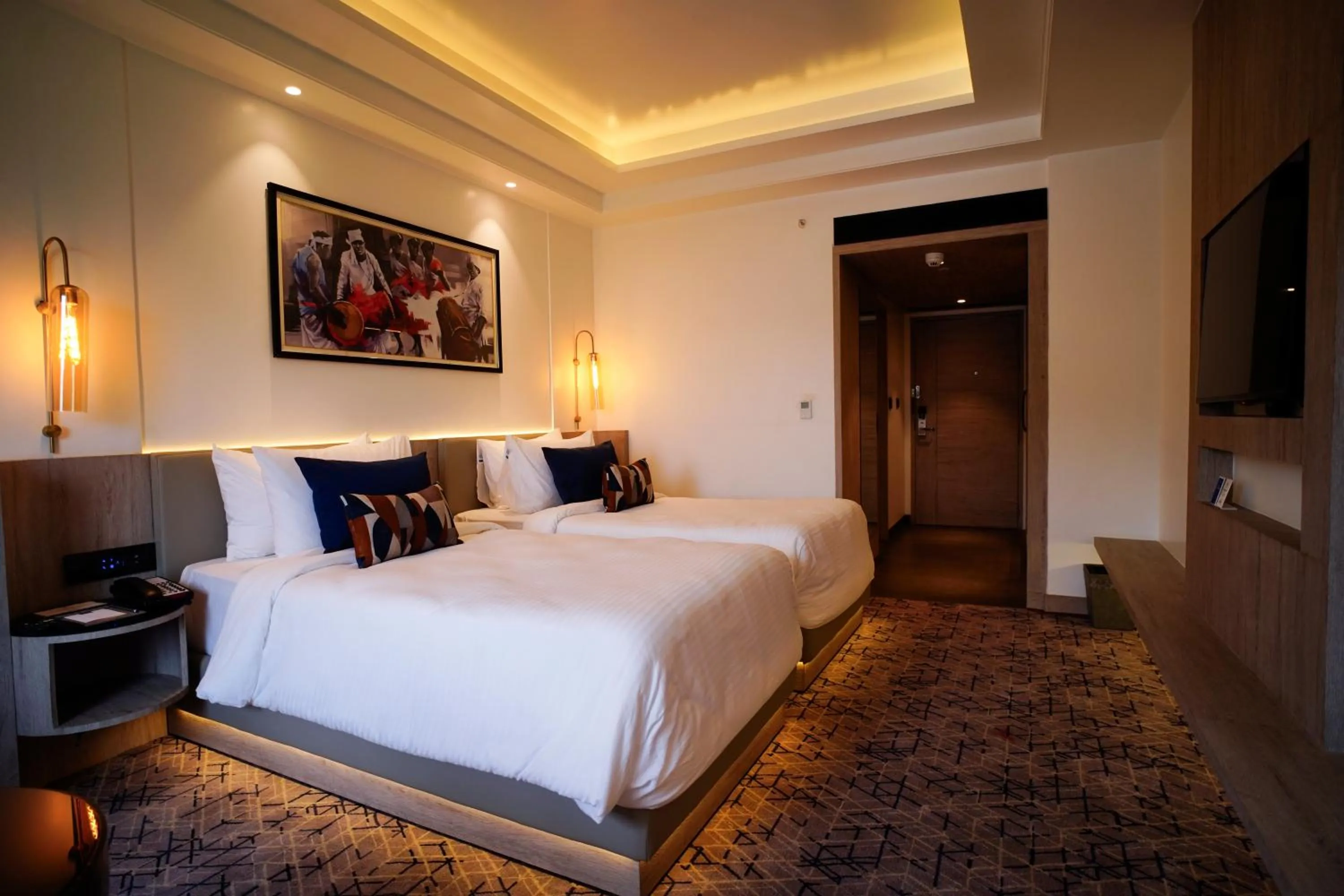 Bed in Ishaan Sarovar Portico Deoghar