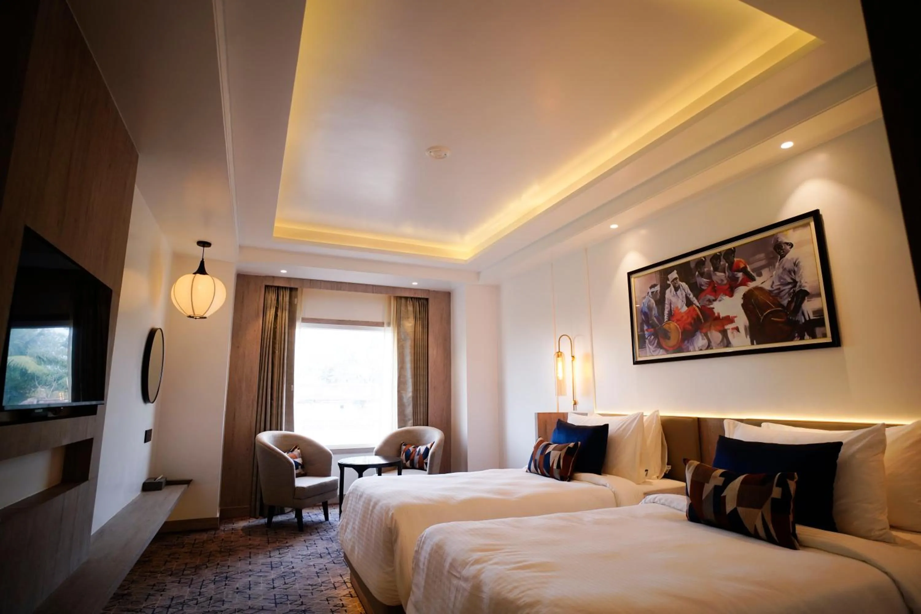 Bed in Ishaan Sarovar Portico Deoghar