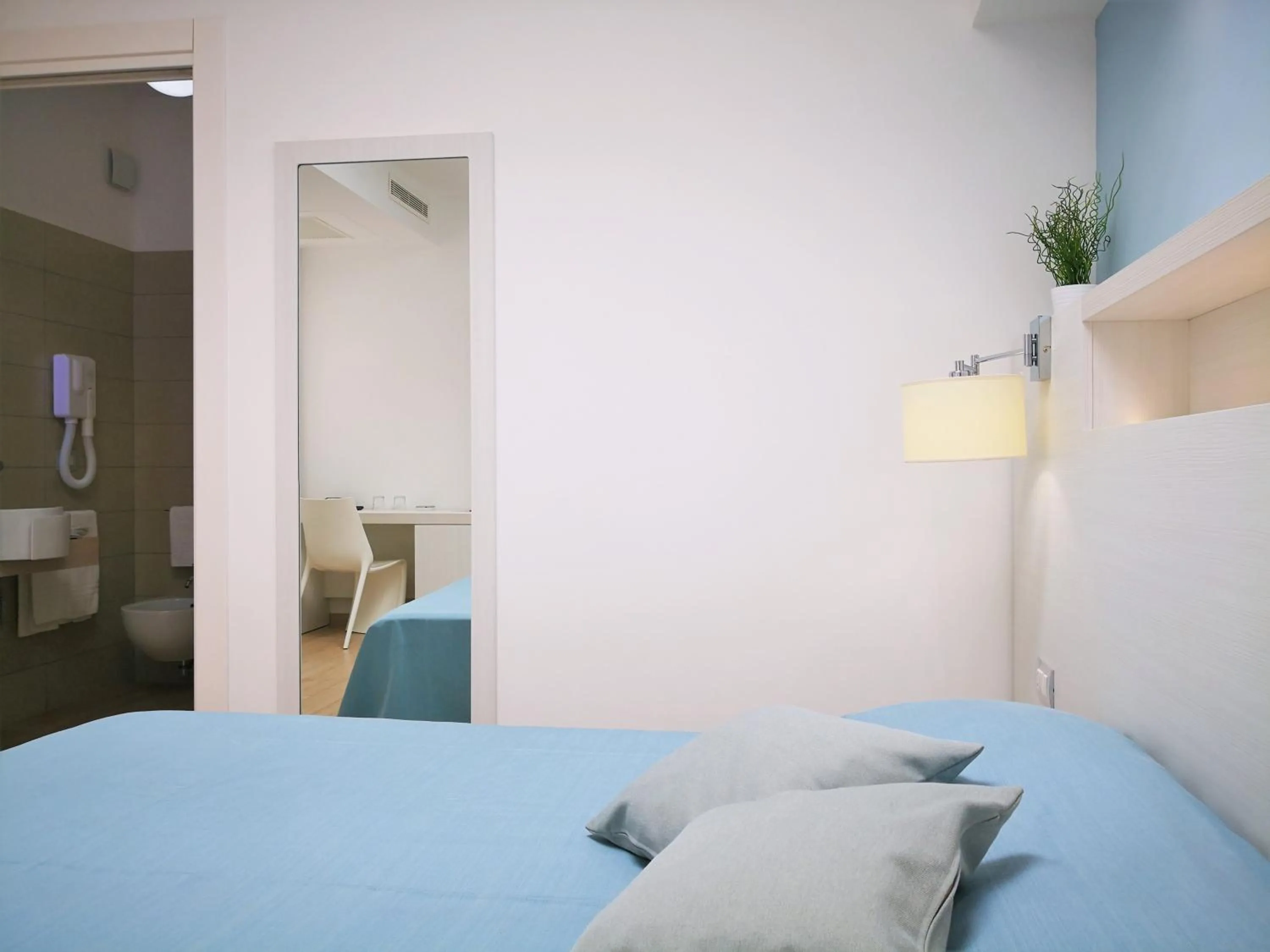 Bed in Hotel Perla Gaia