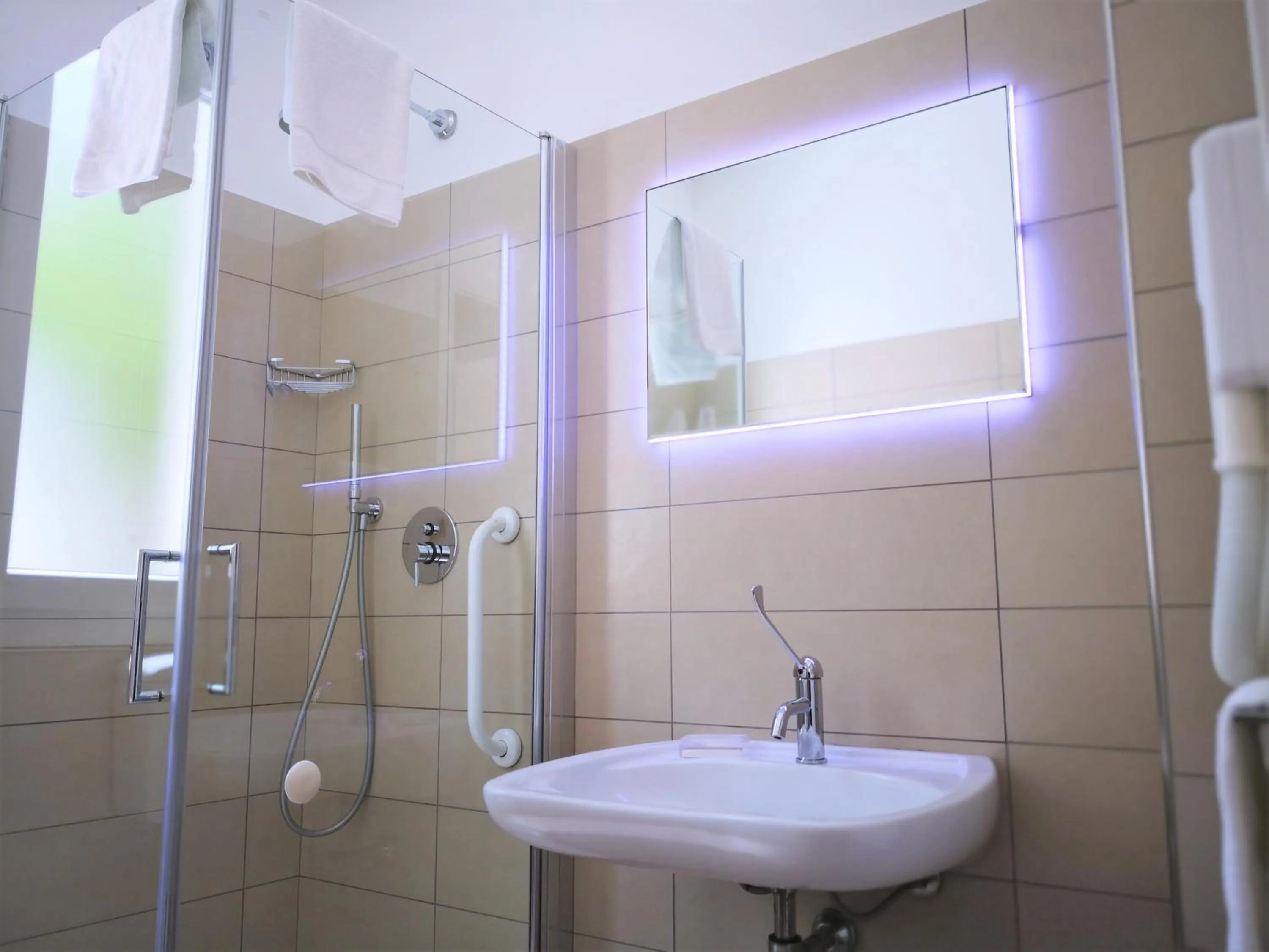 Bathroom in Hotel Perla Gaia