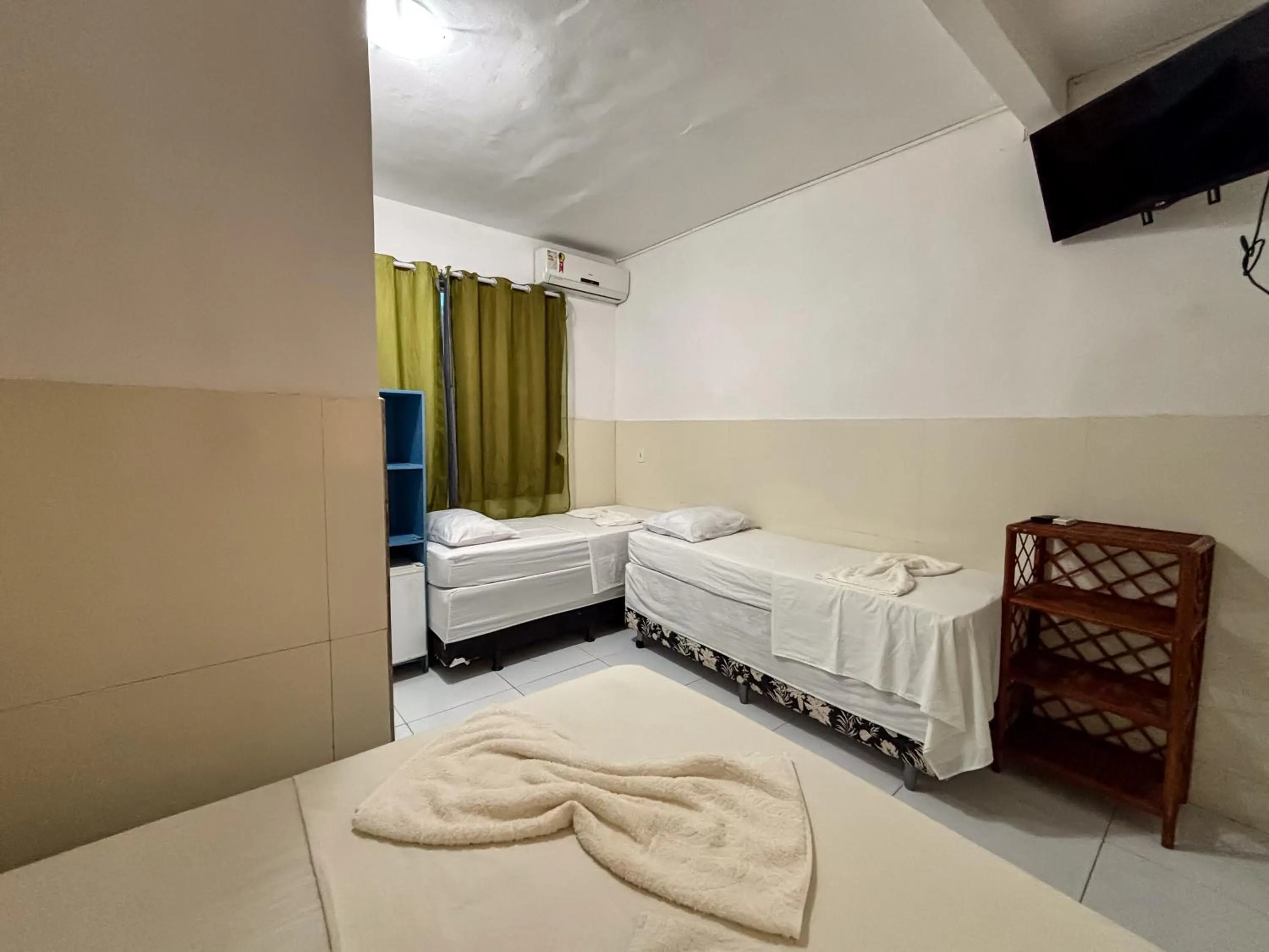 Bed in Pousada Beija flor