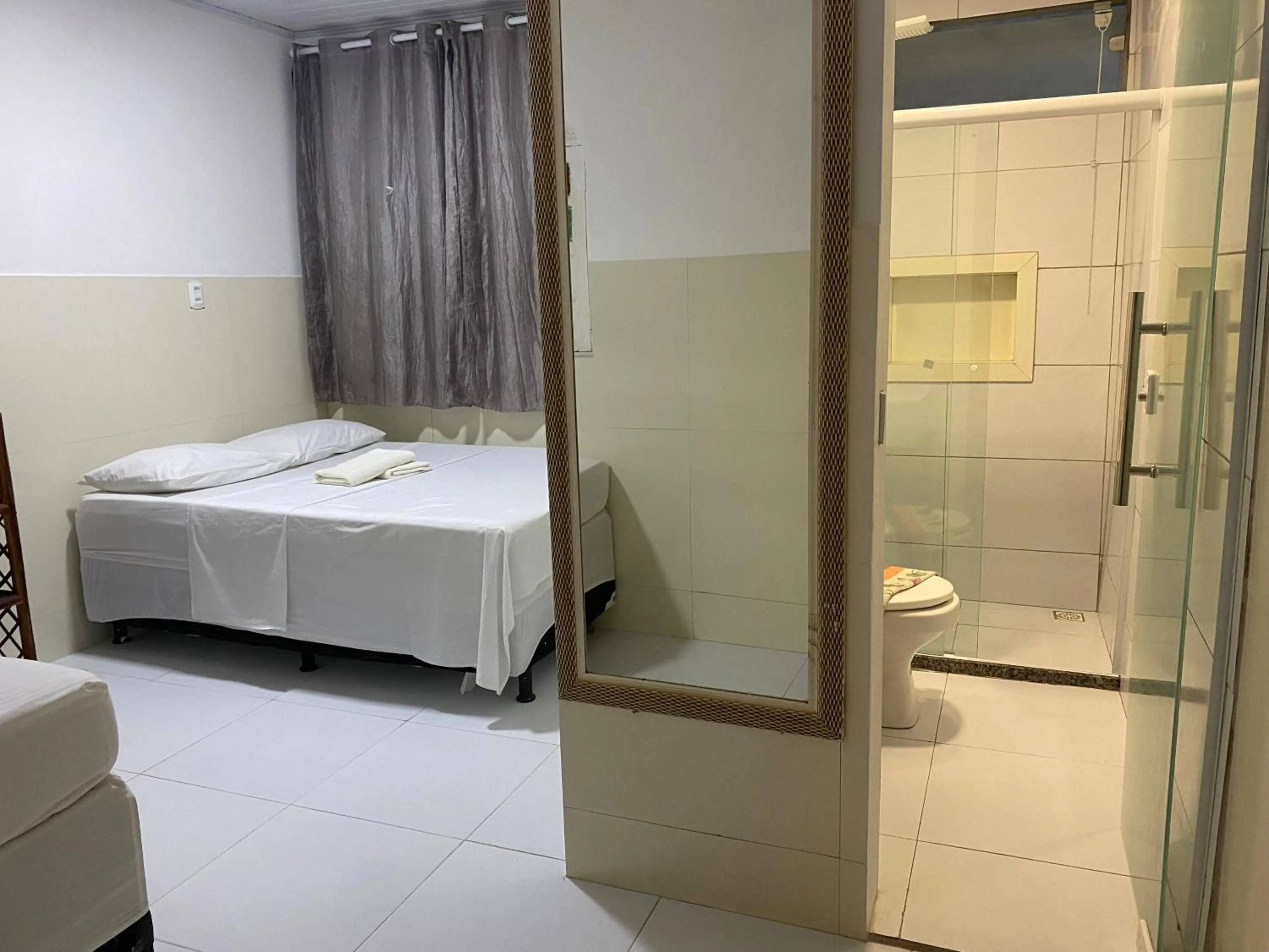 Bed in Pousada Beija flor