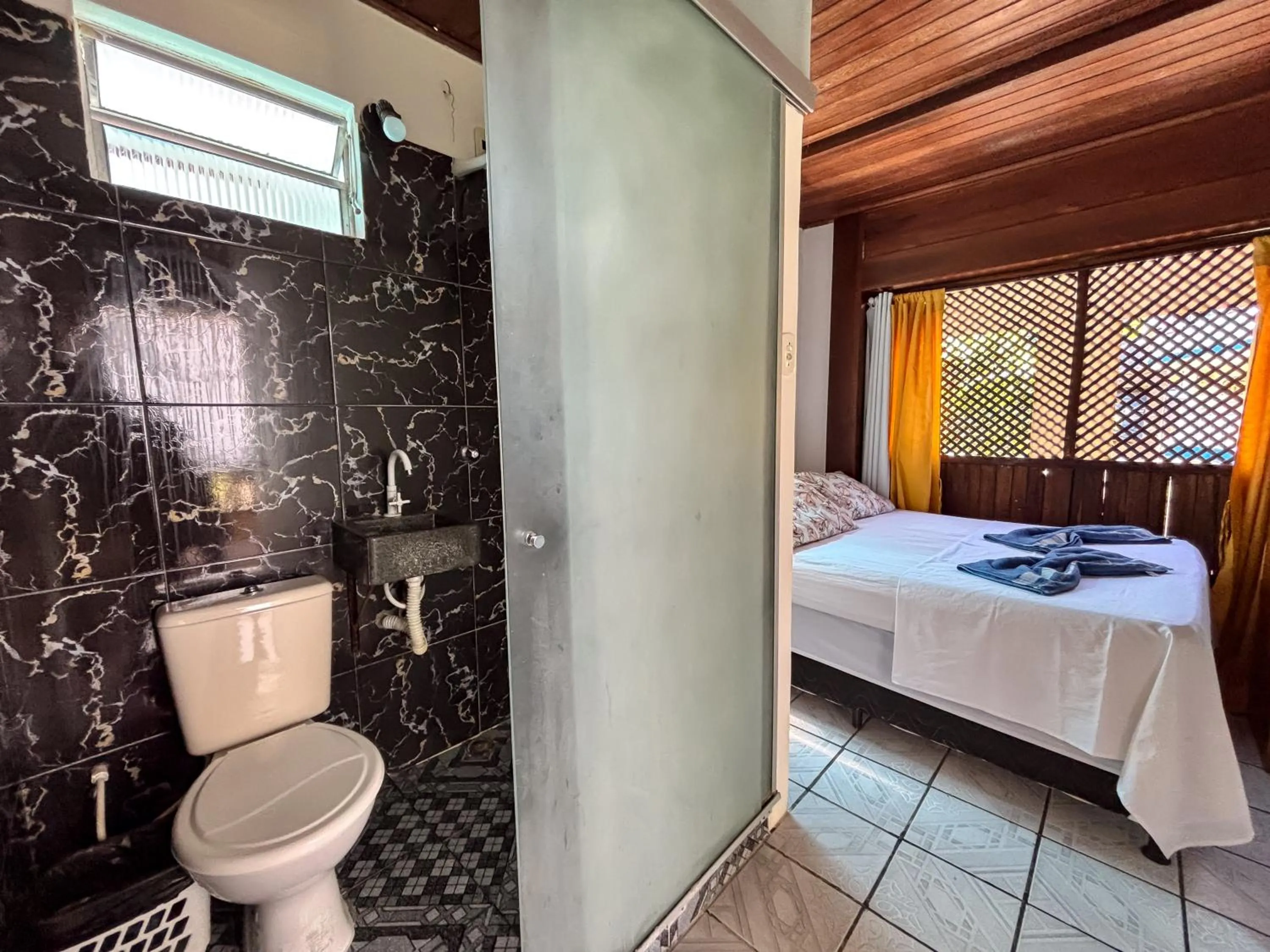 Bed in Pousada Beija flor