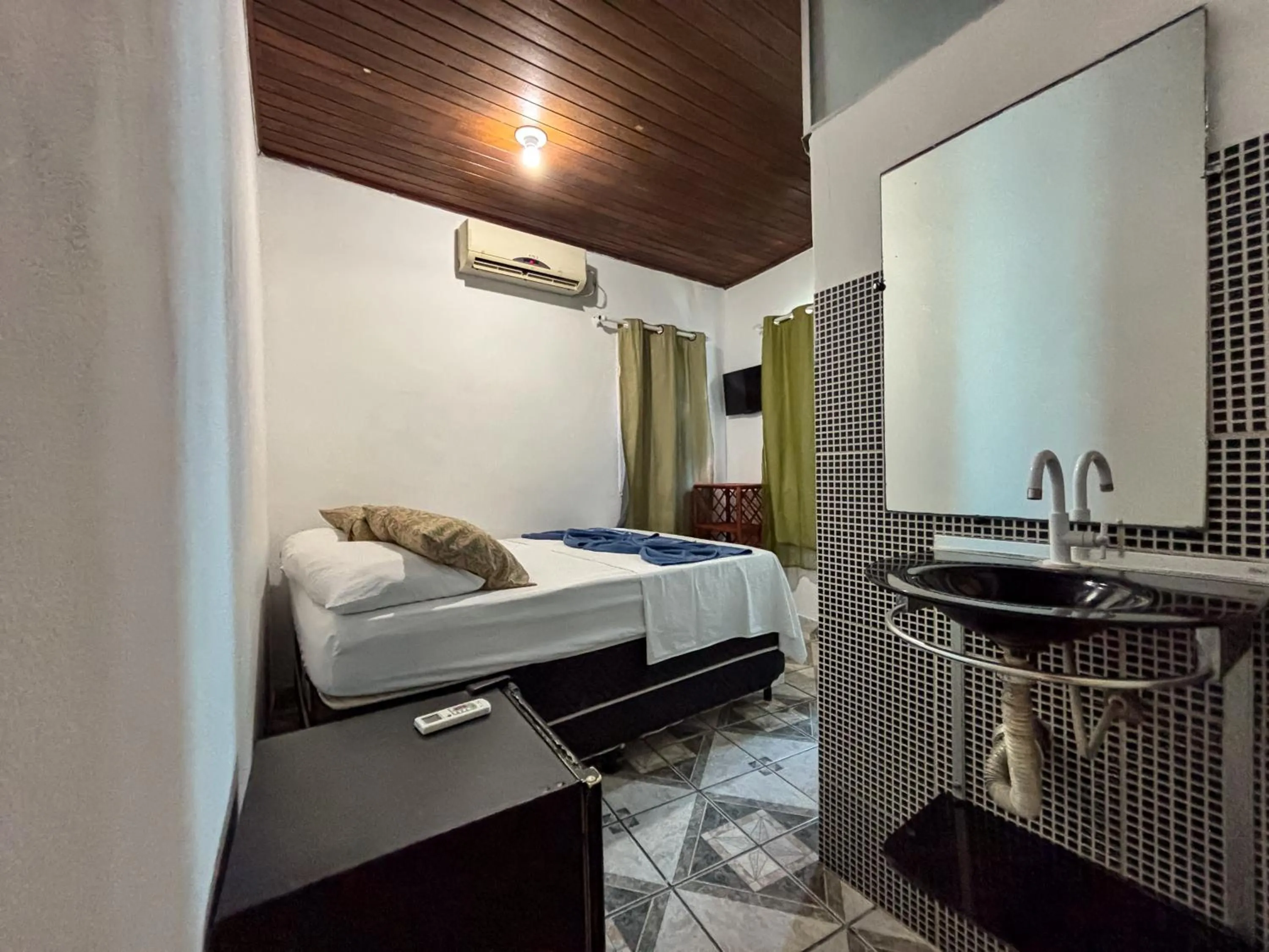 Bed in Pousada Beija flor