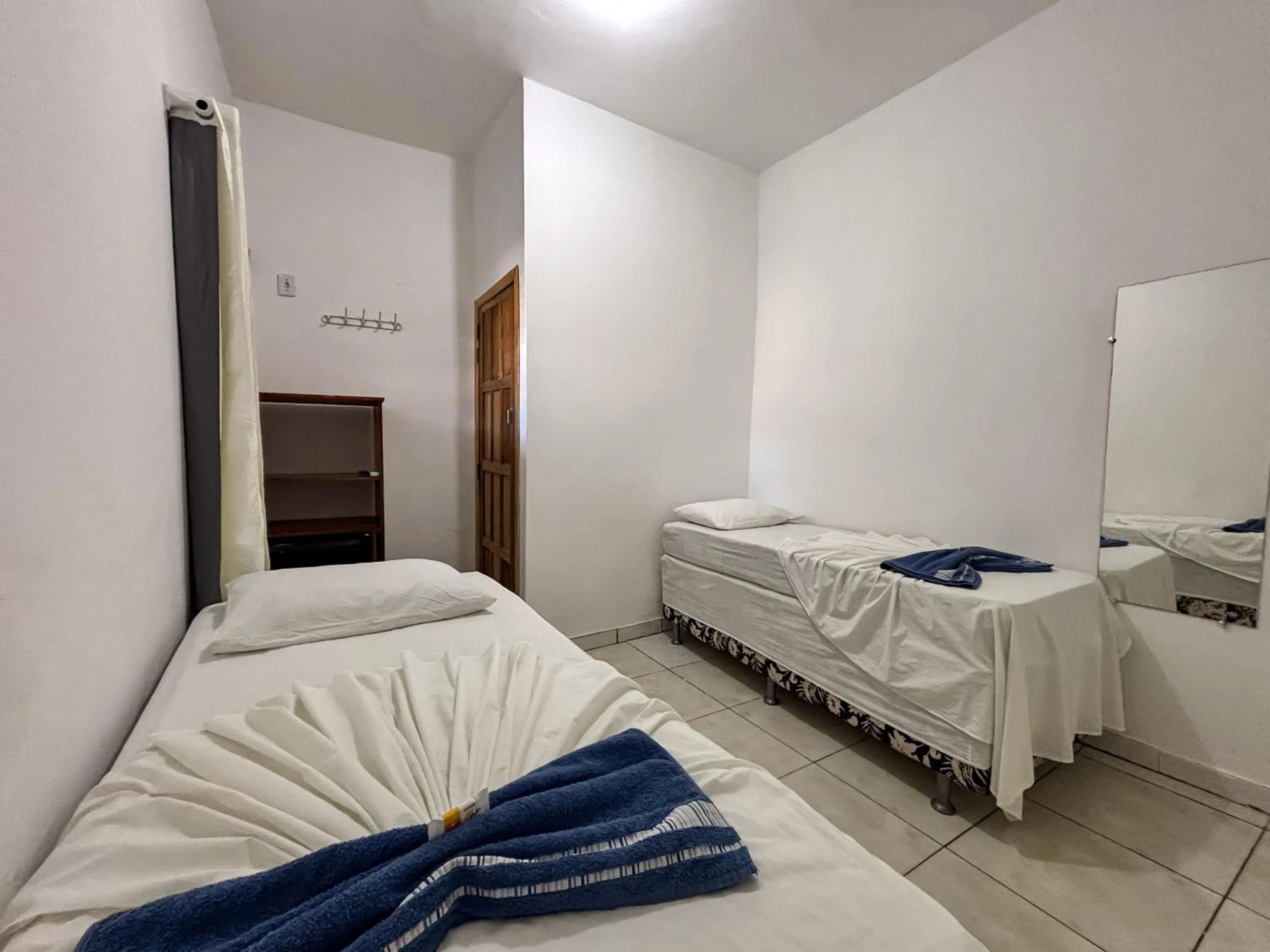 Bed in Pousada Beija flor