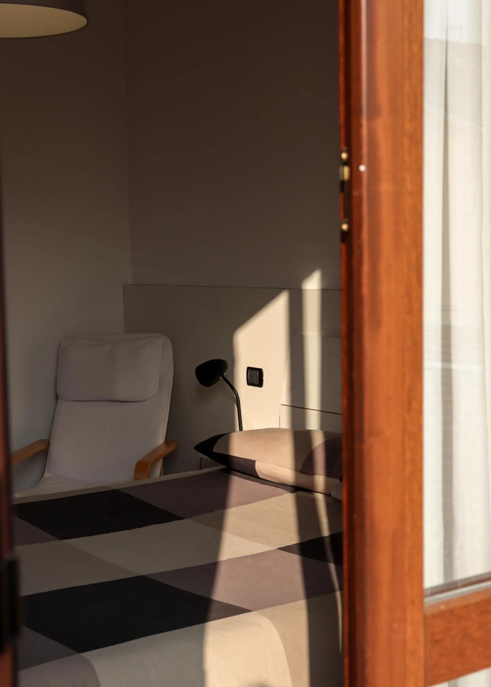 Bedroom in La Corte di Brusuglio Apartments