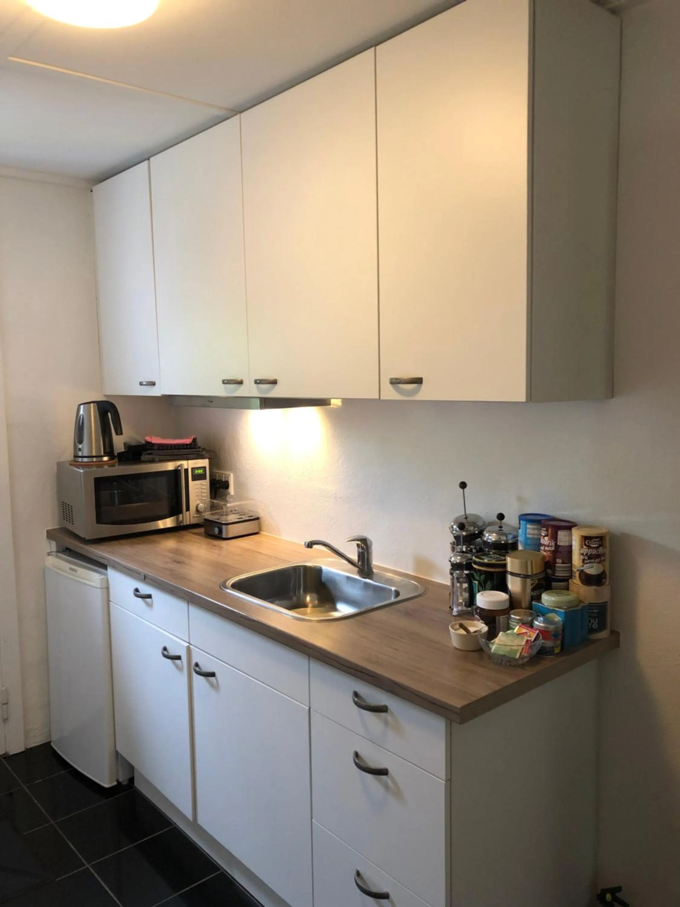 Communal kitchen in Helts B&B - Helts Guesthouse