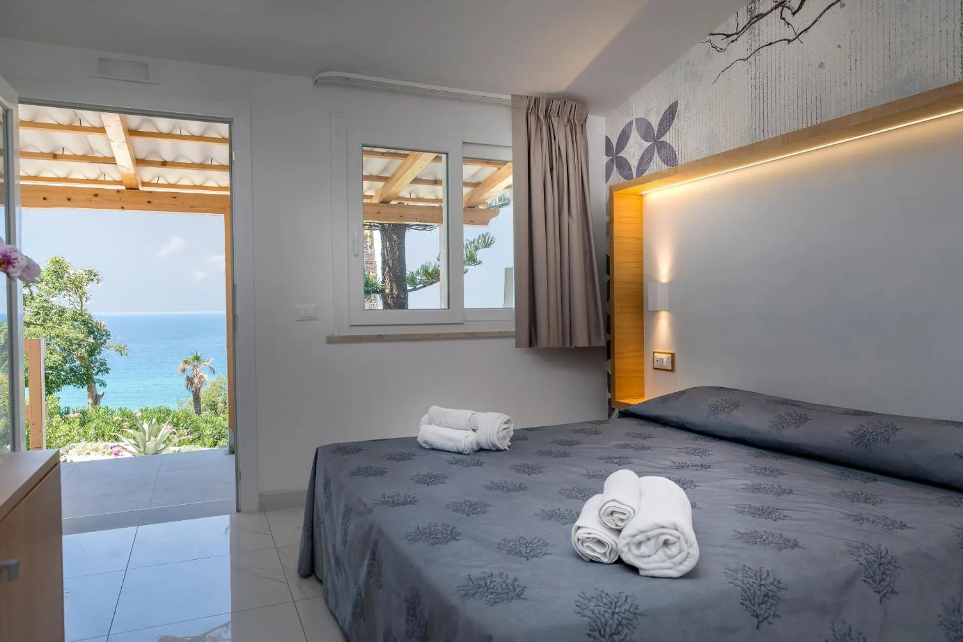 Bed in Hotel Villaggio Stromboli