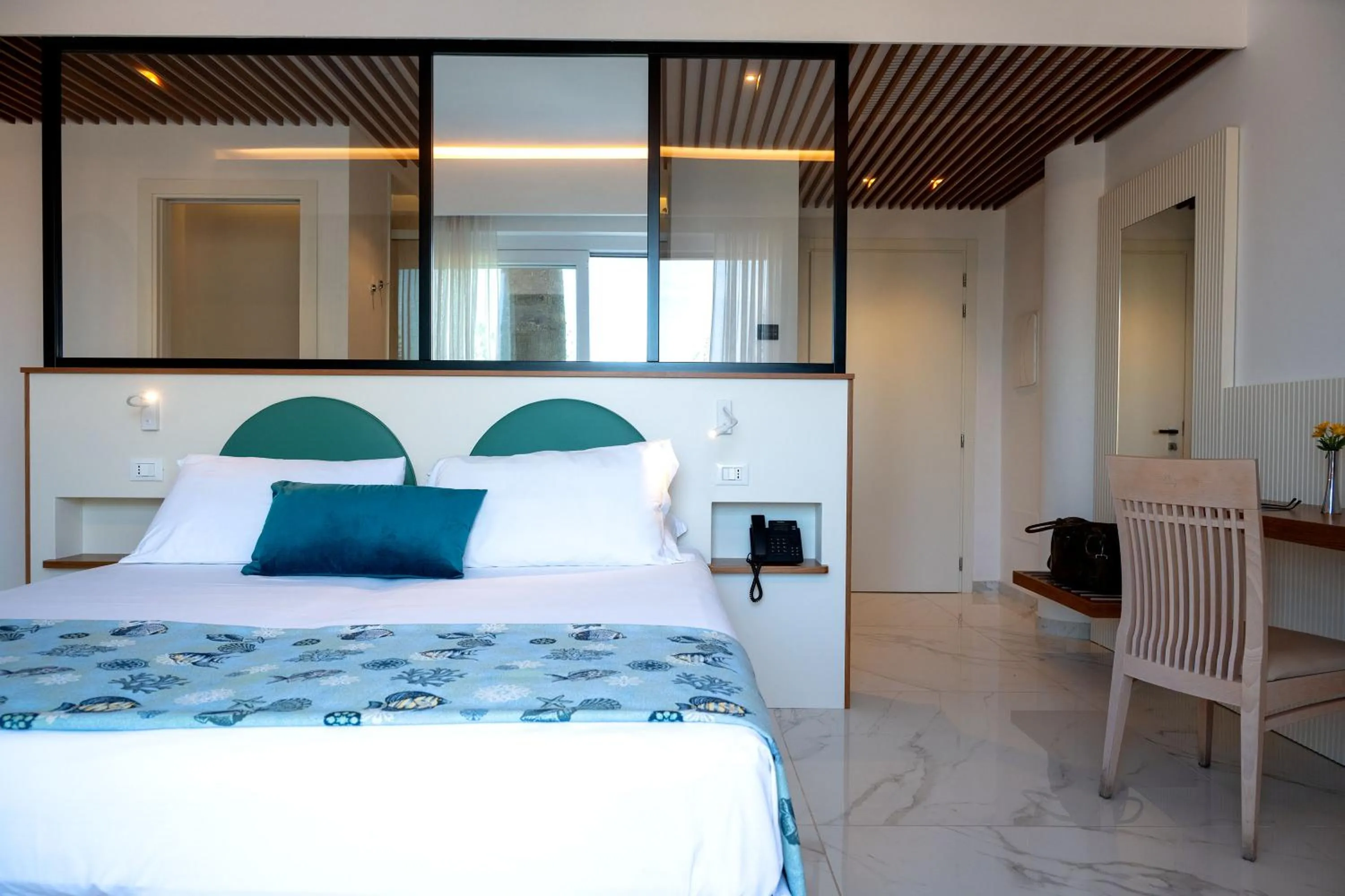 Bed in Hotel Villaggio Stromboli