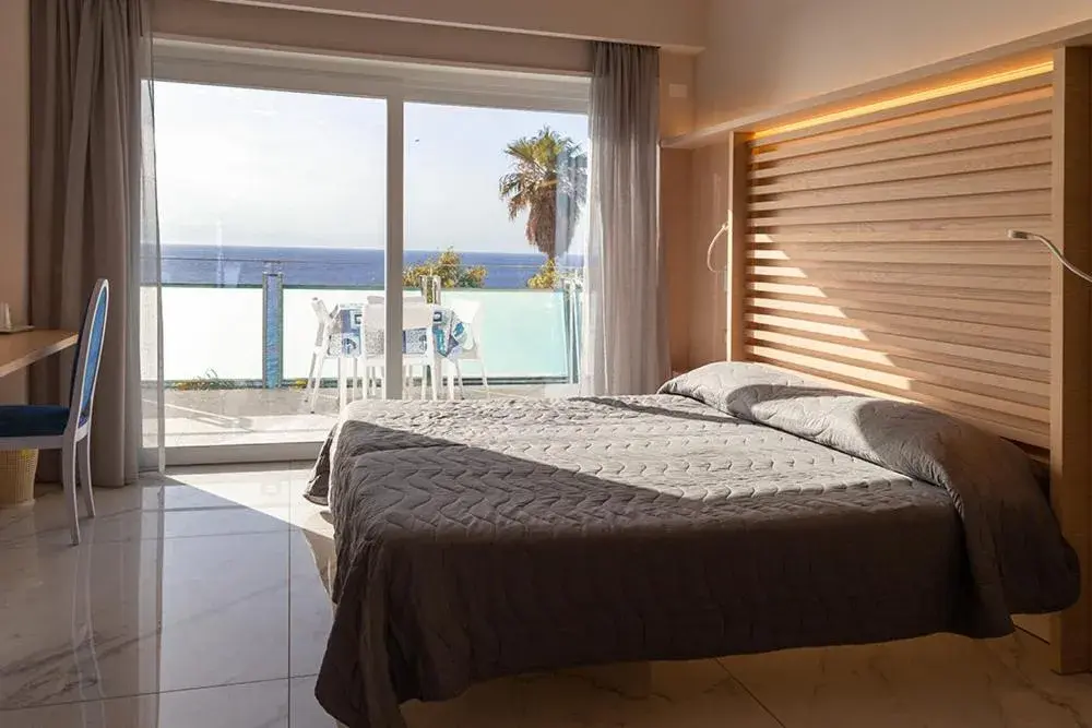 Deluxe Quadruple Room in Hotel Villaggio Stromboli Deluxe Quadruple Room in Hotel Villaggio Stromboli