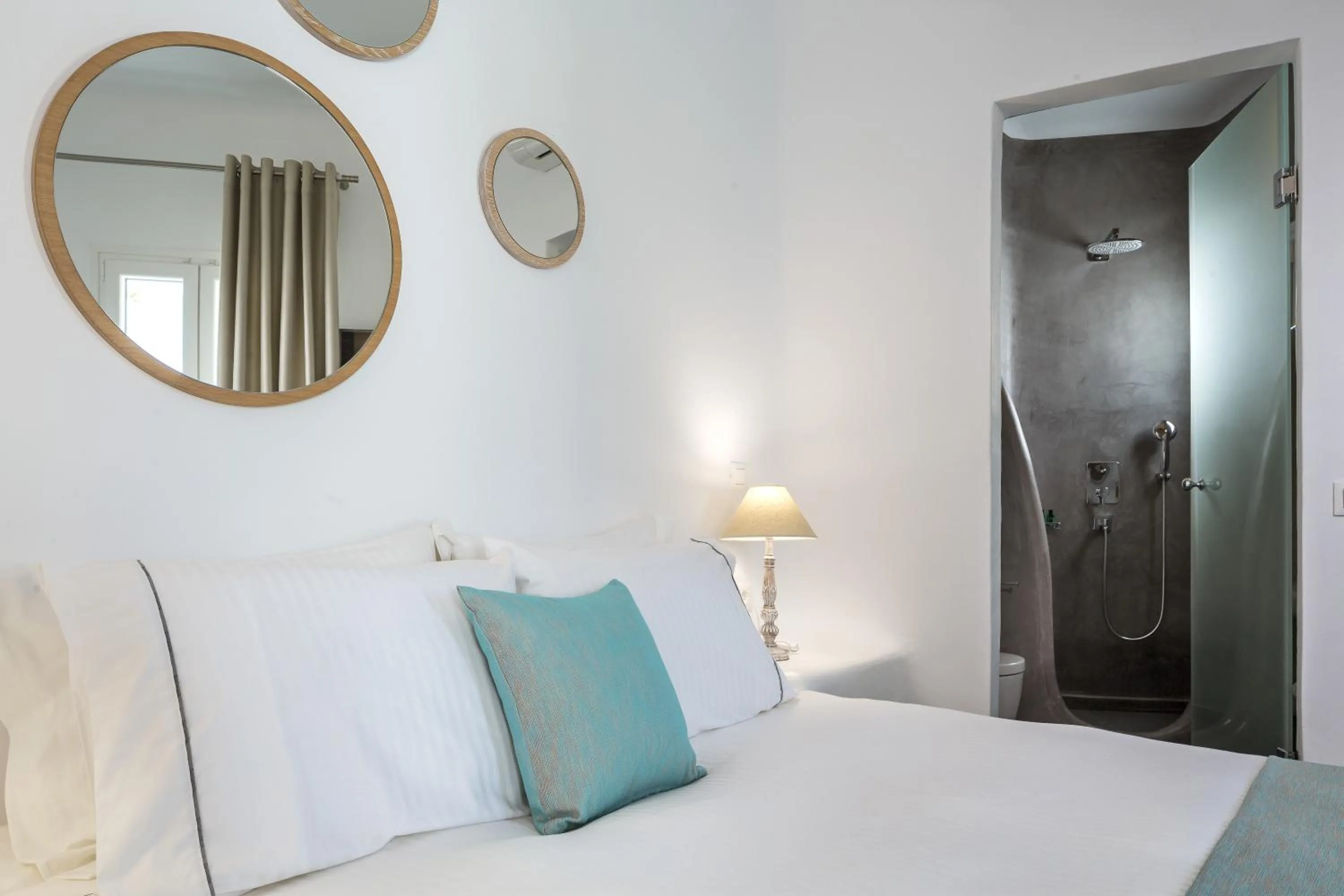 Bed in Colours of Mykonos Luxury Residences & Suites