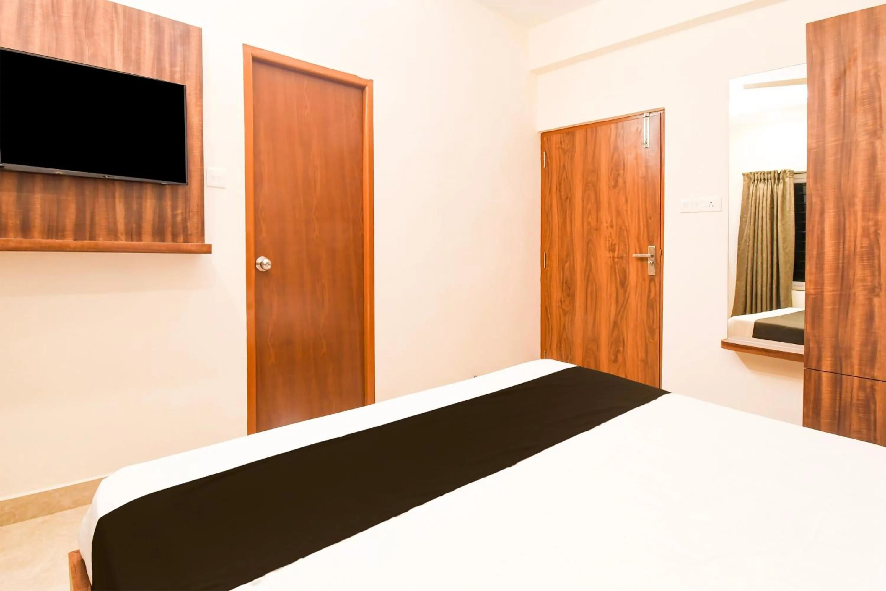 Bedroom in Super Hotel O GAJAPATI PREMIUM