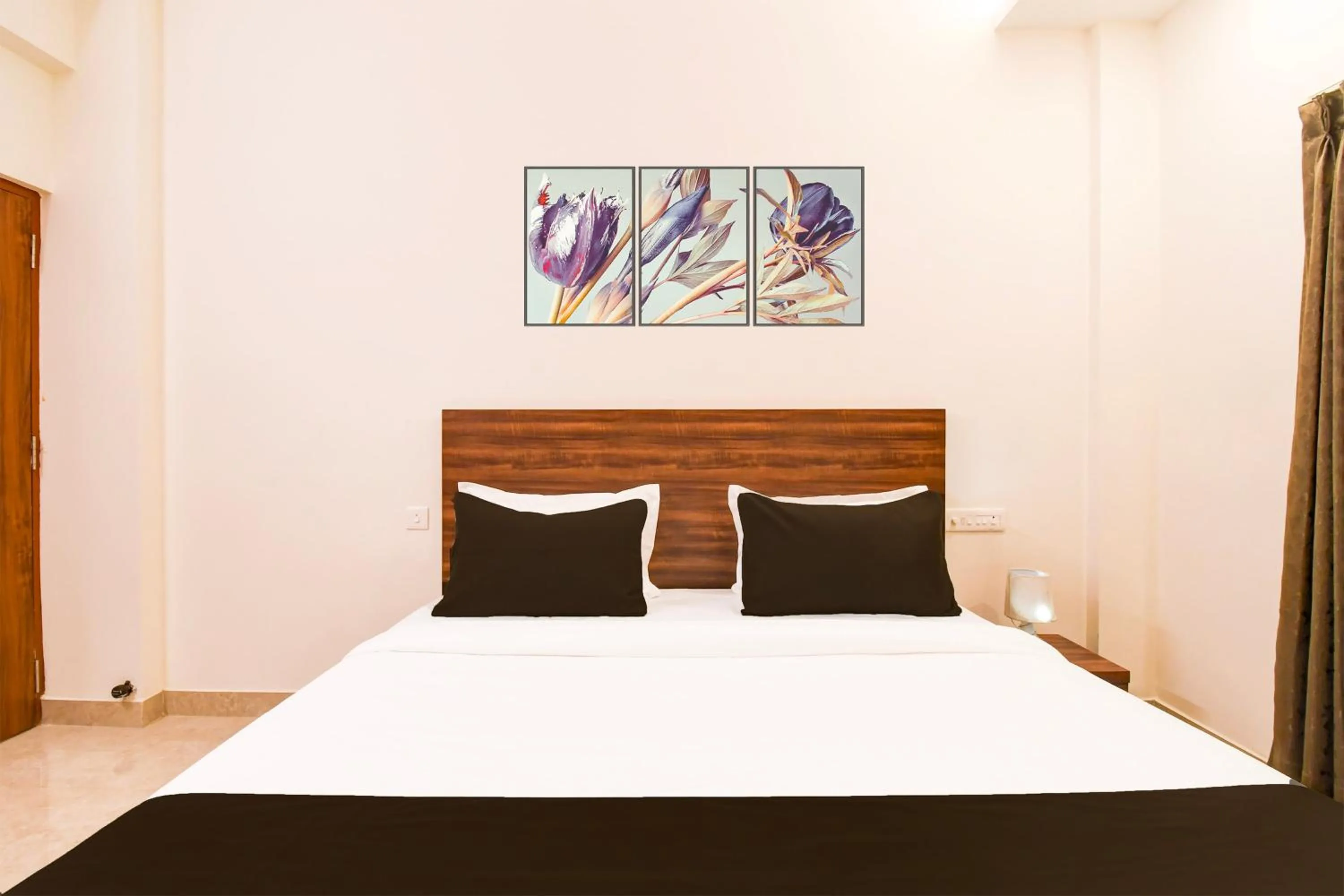 Bedroom in Super Hotel O GAJAPATI PREMIUM