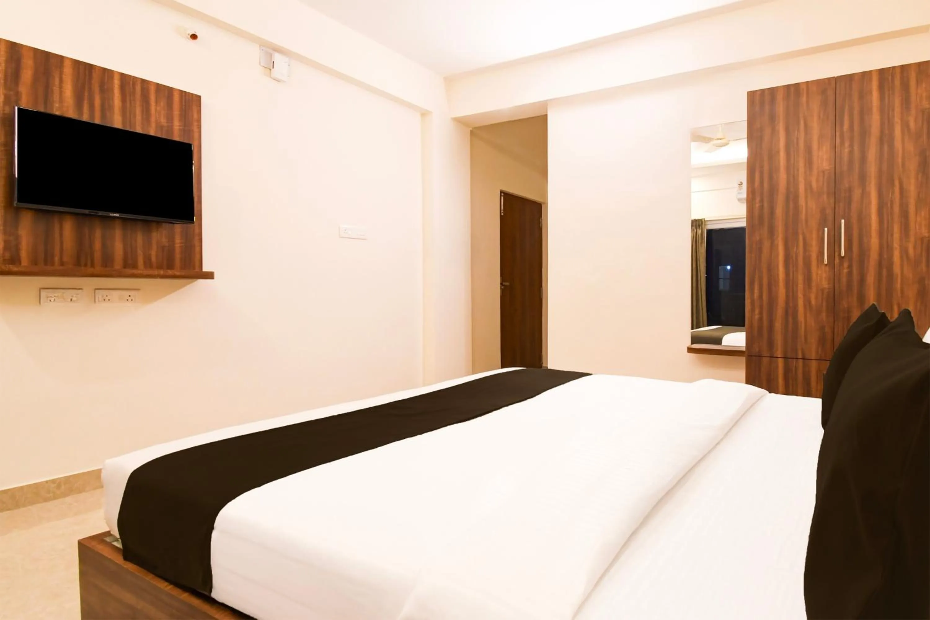 Bedroom in Super Hotel O GAJAPATI PREMIUM