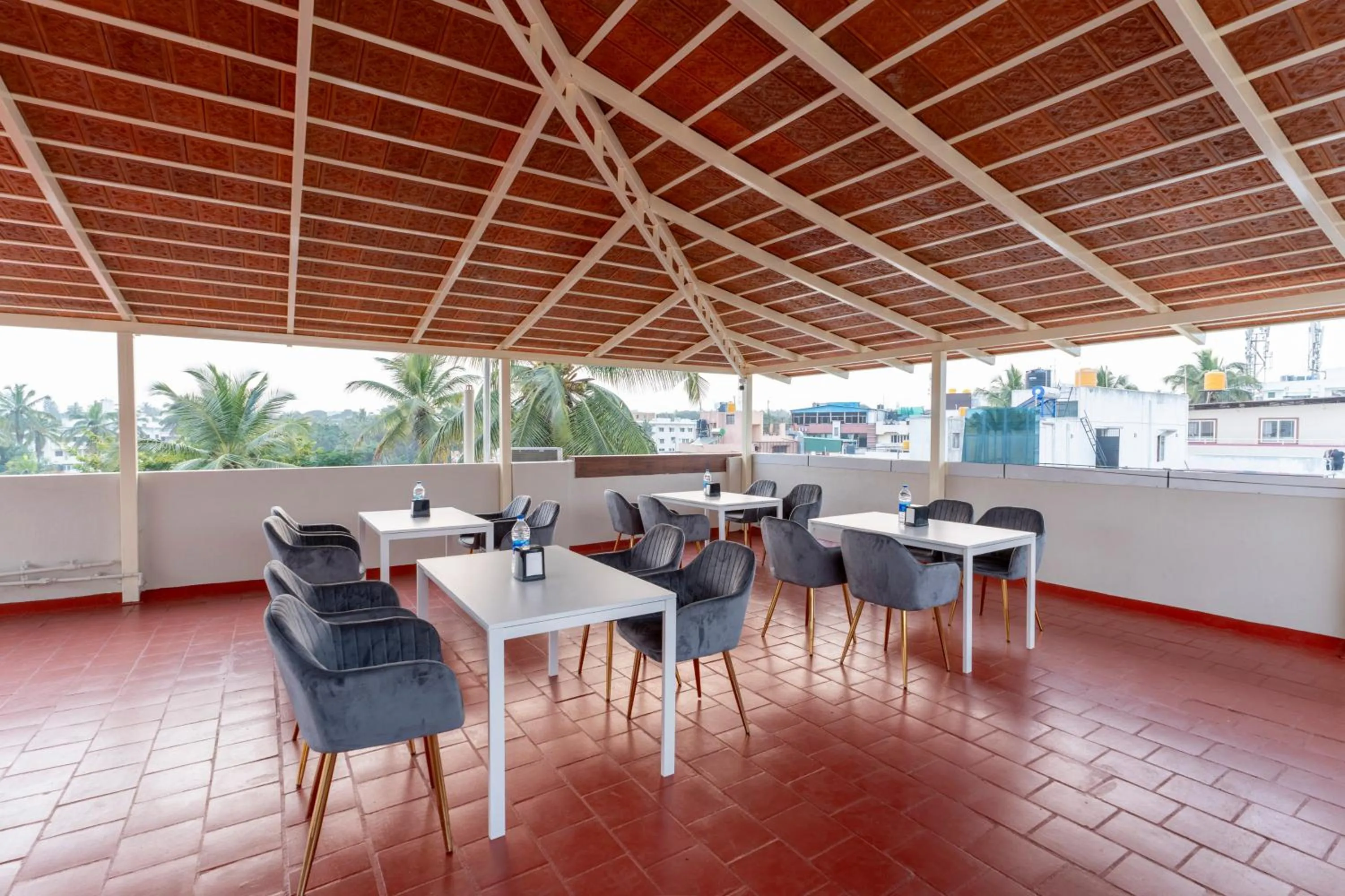 Dining area in Treebo Sanmaya Retreat, 15 Mins From Mysore Palace