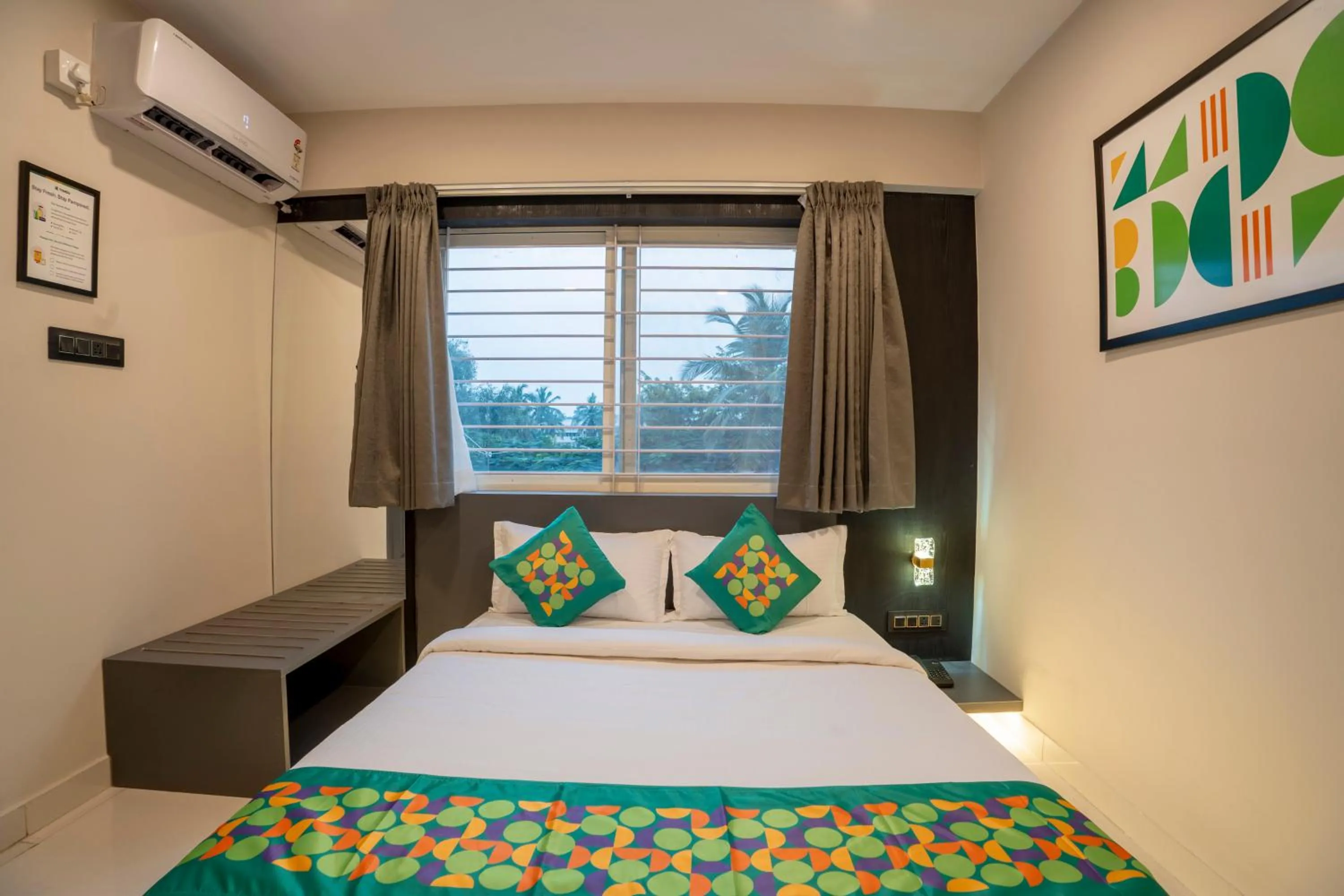 Bedroom, Bed in Treebo Sanmaya Retreat, 15 Mins From Mysore Palace