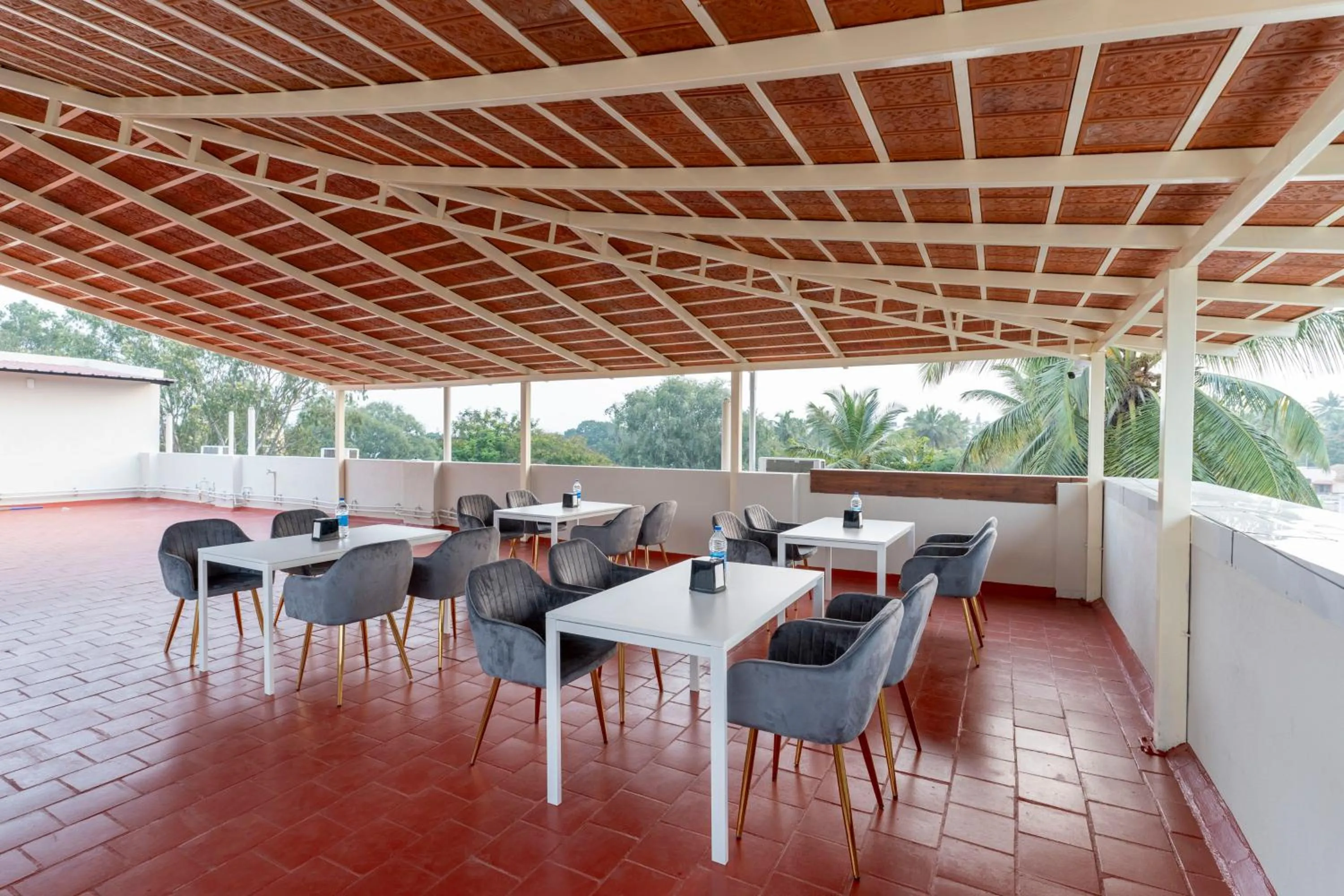 Dining area in Treebo Sanmaya Retreat, 15 Mins From Mysore Palace