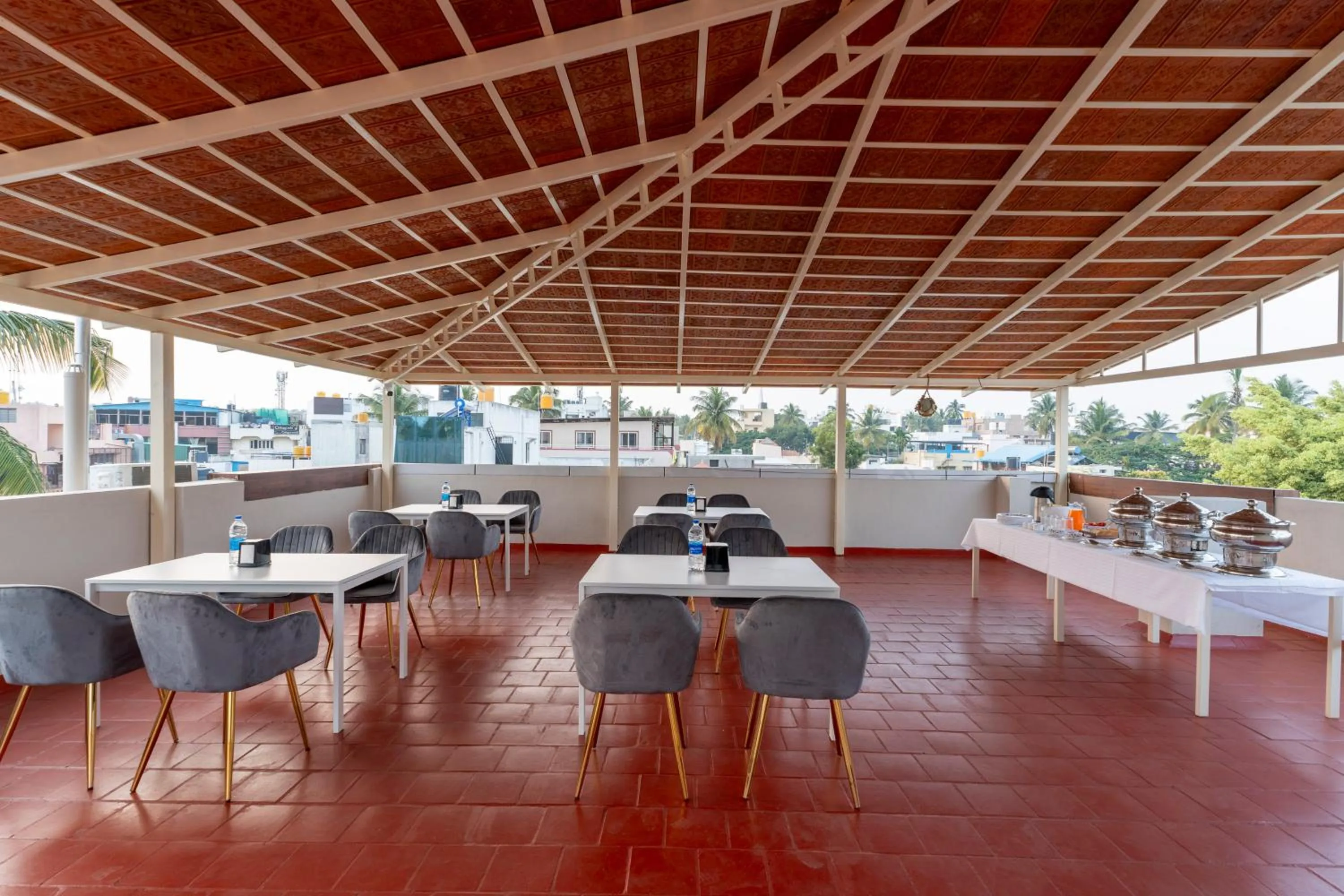 Dining area in Treebo Sanmaya Retreat, 15 Mins From Mysore Palace
