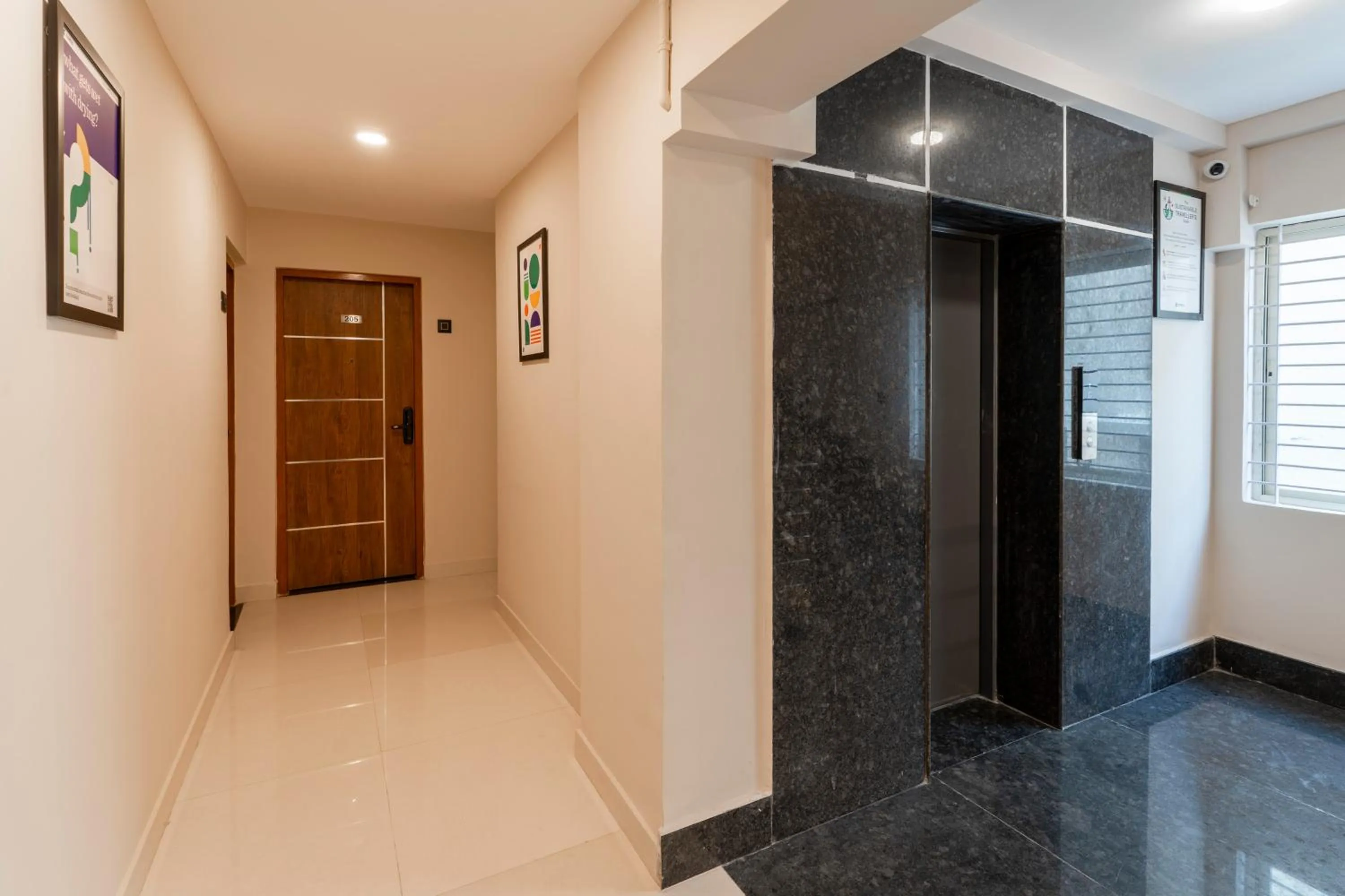 elevator in Treebo Sanmaya Retreat, 15 Mins From Mysore Palace