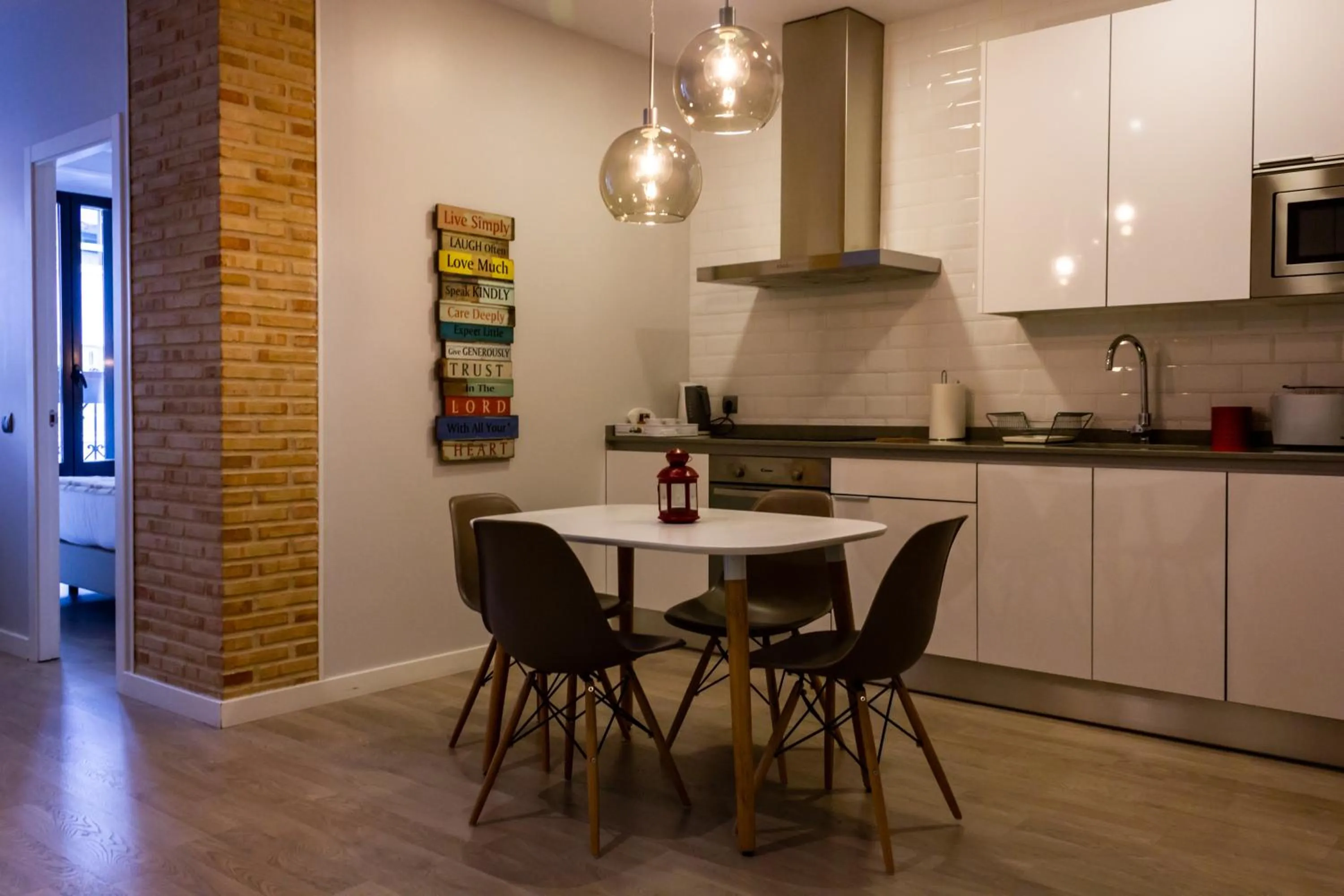 Kitchen or kitchenette in Arenal Suites Puerta del Sol