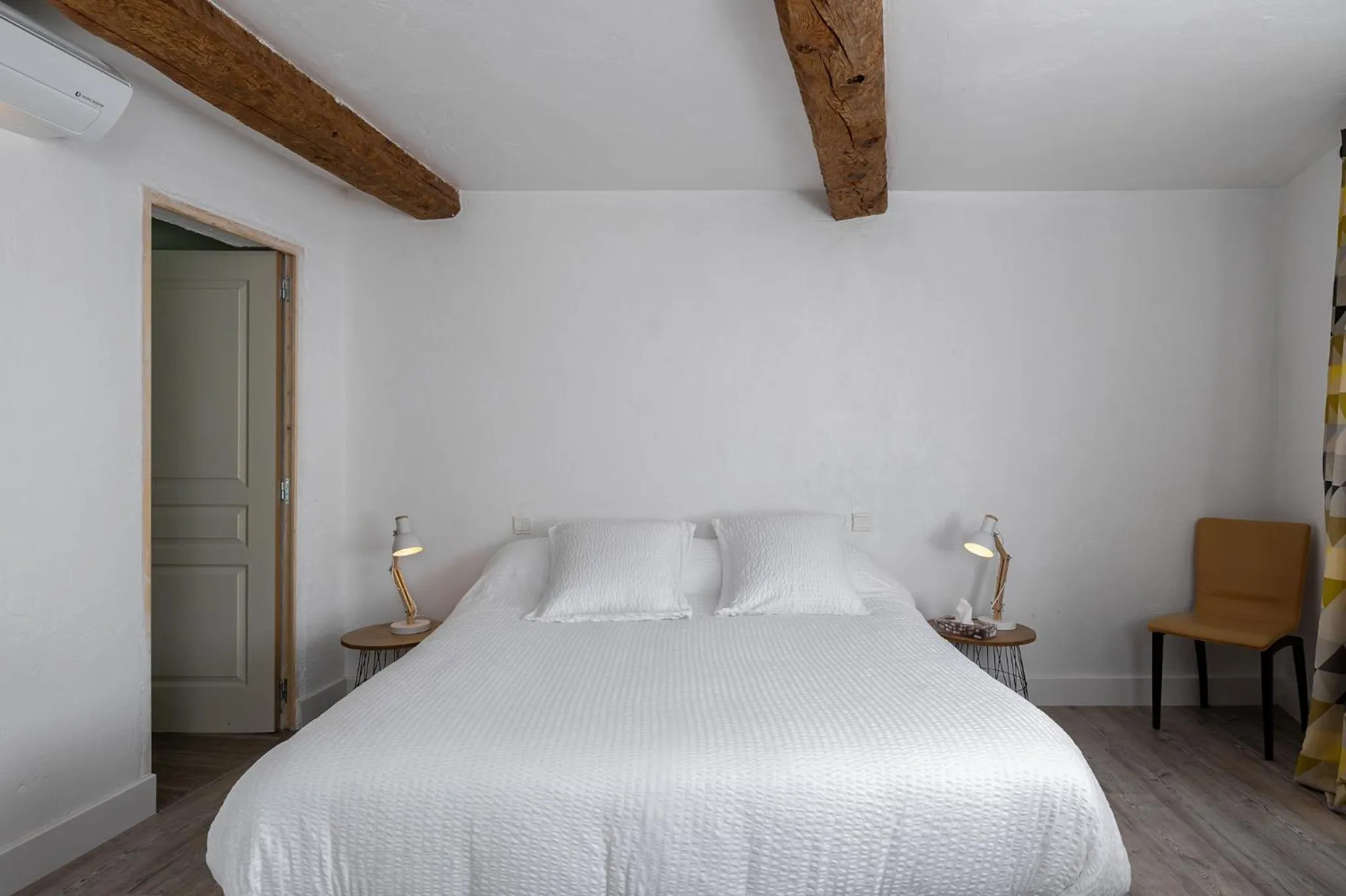 Bed in Maison Carles BnB
