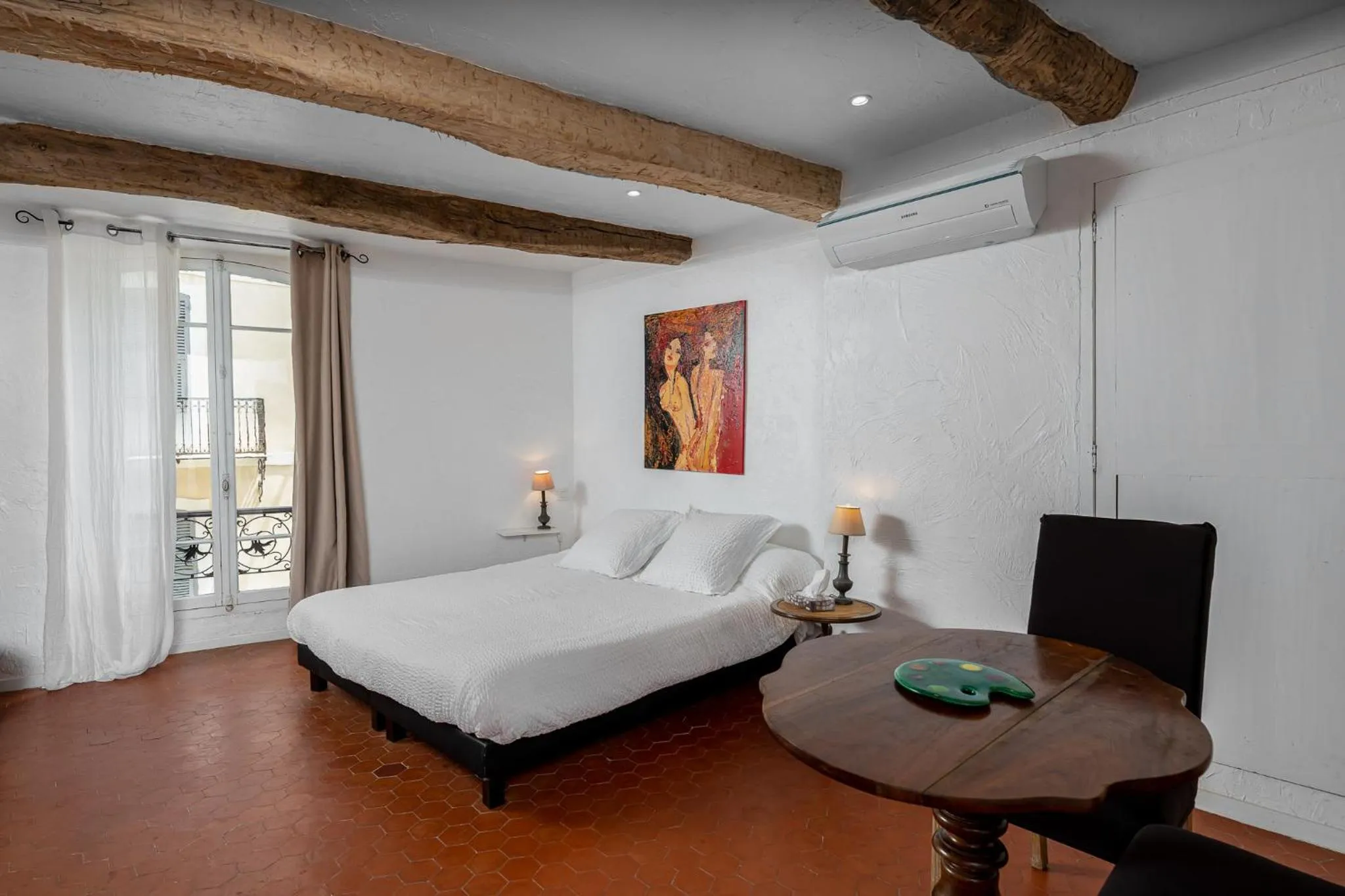 Bed in Maison Carles BnB