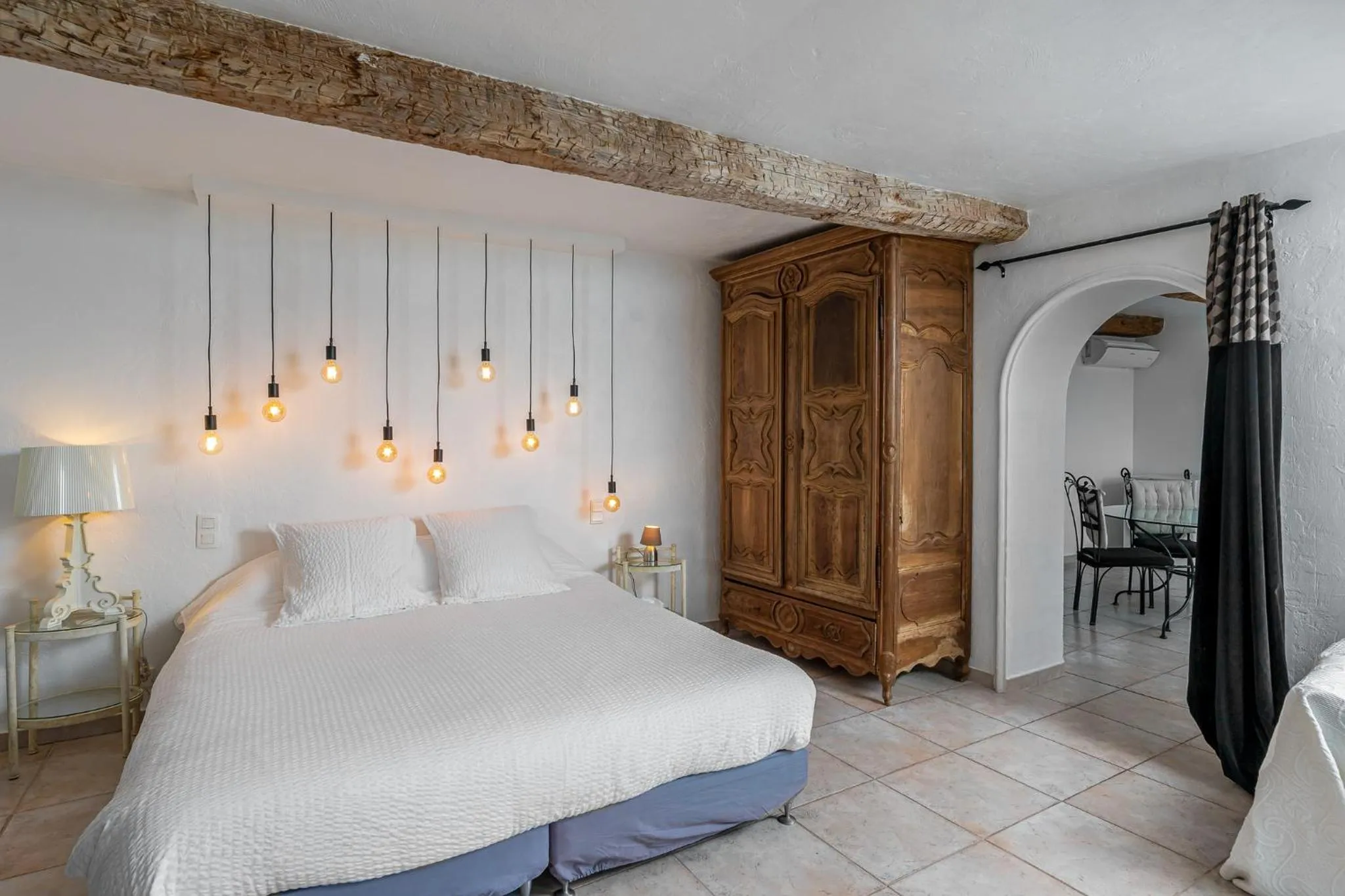 Bed in Maison Carles BnB