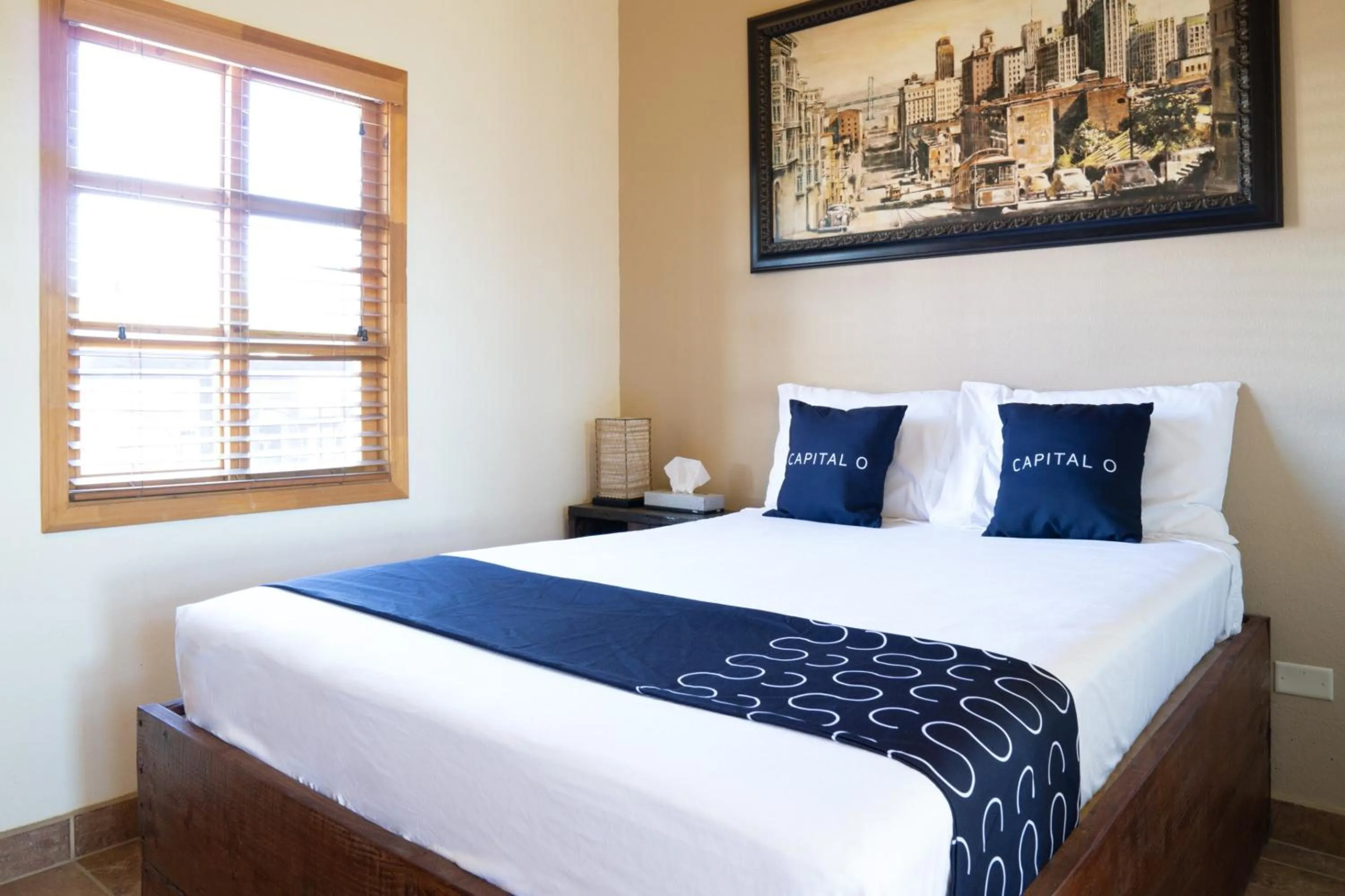 Bedroom, Bed in Capital O Hotel Villa Azura