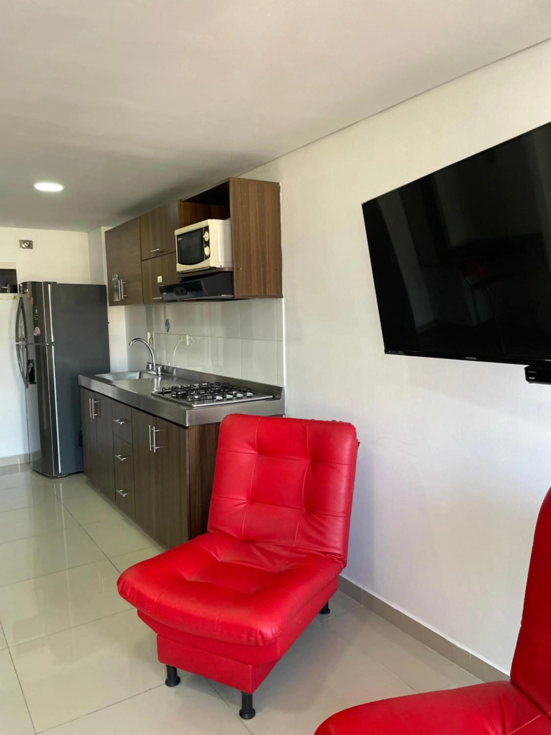 TV and multimedia in Ivanna Jumar ApartaHotel - Laureles Estadio