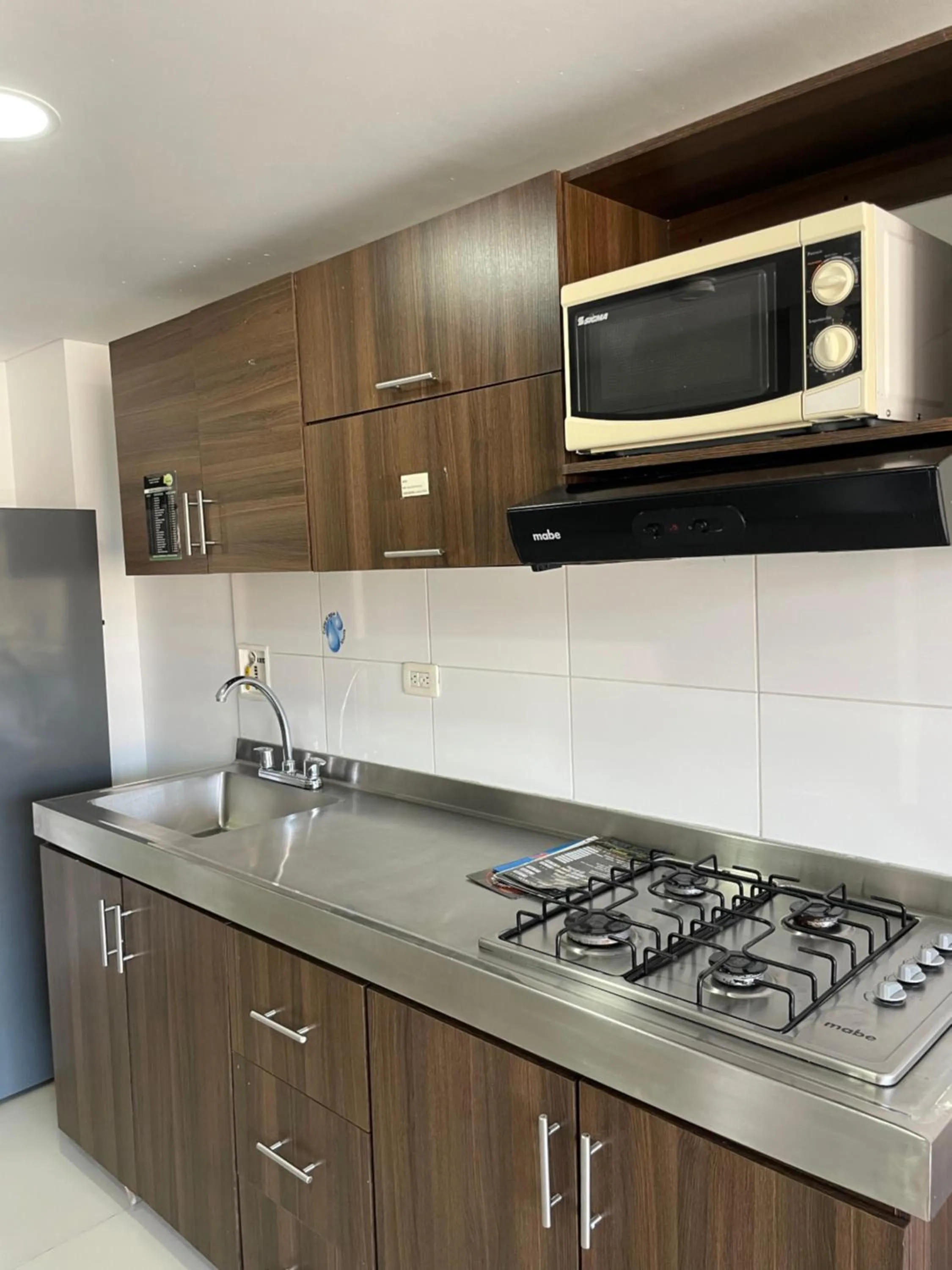 Kitchen or kitchenette in Ivanna Jumar ApartaHotel - Laureles Estadio
