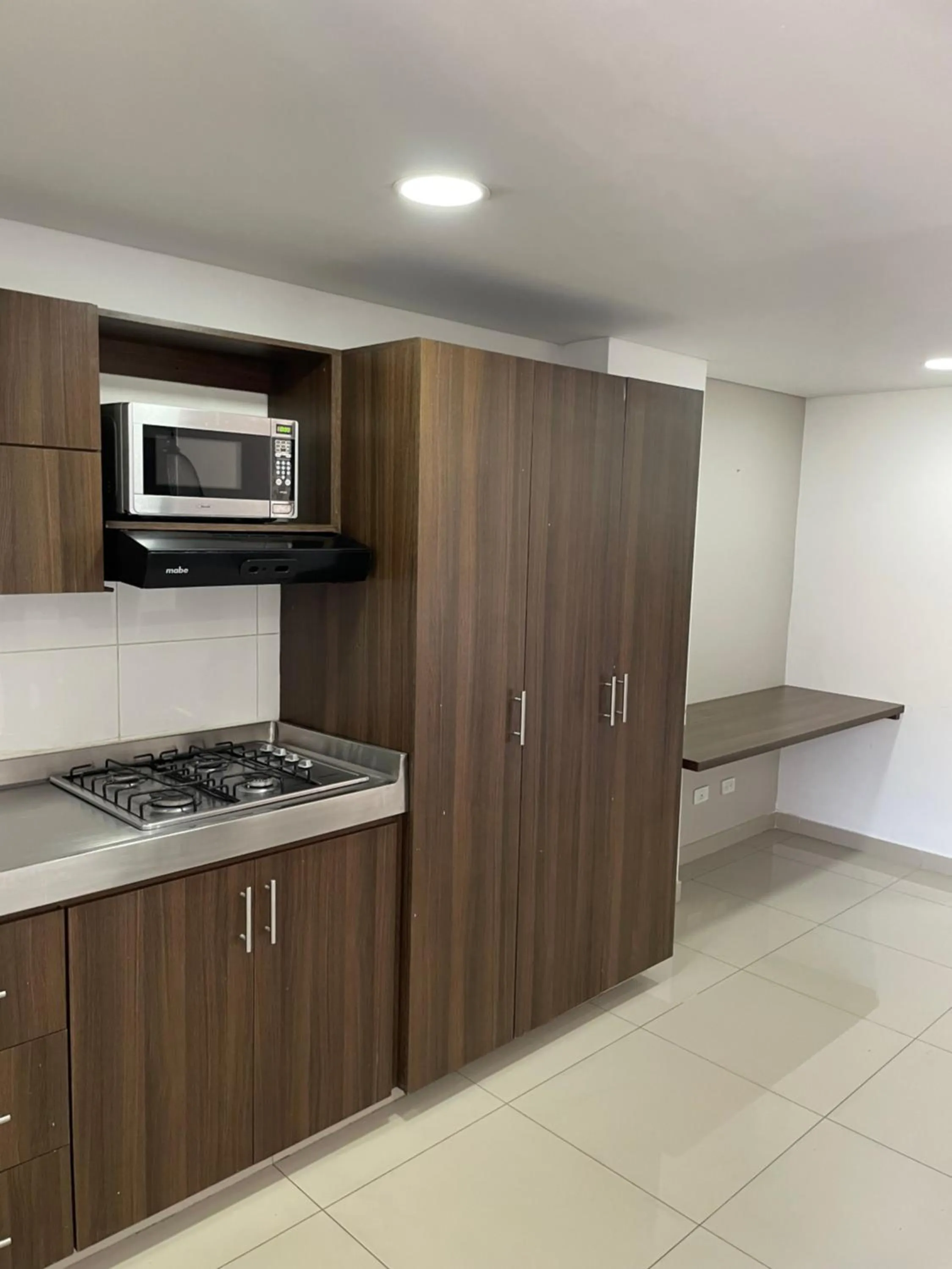 Kitchen or kitchenette in Ivanna Jumar ApartaHotel - Laureles Estadio