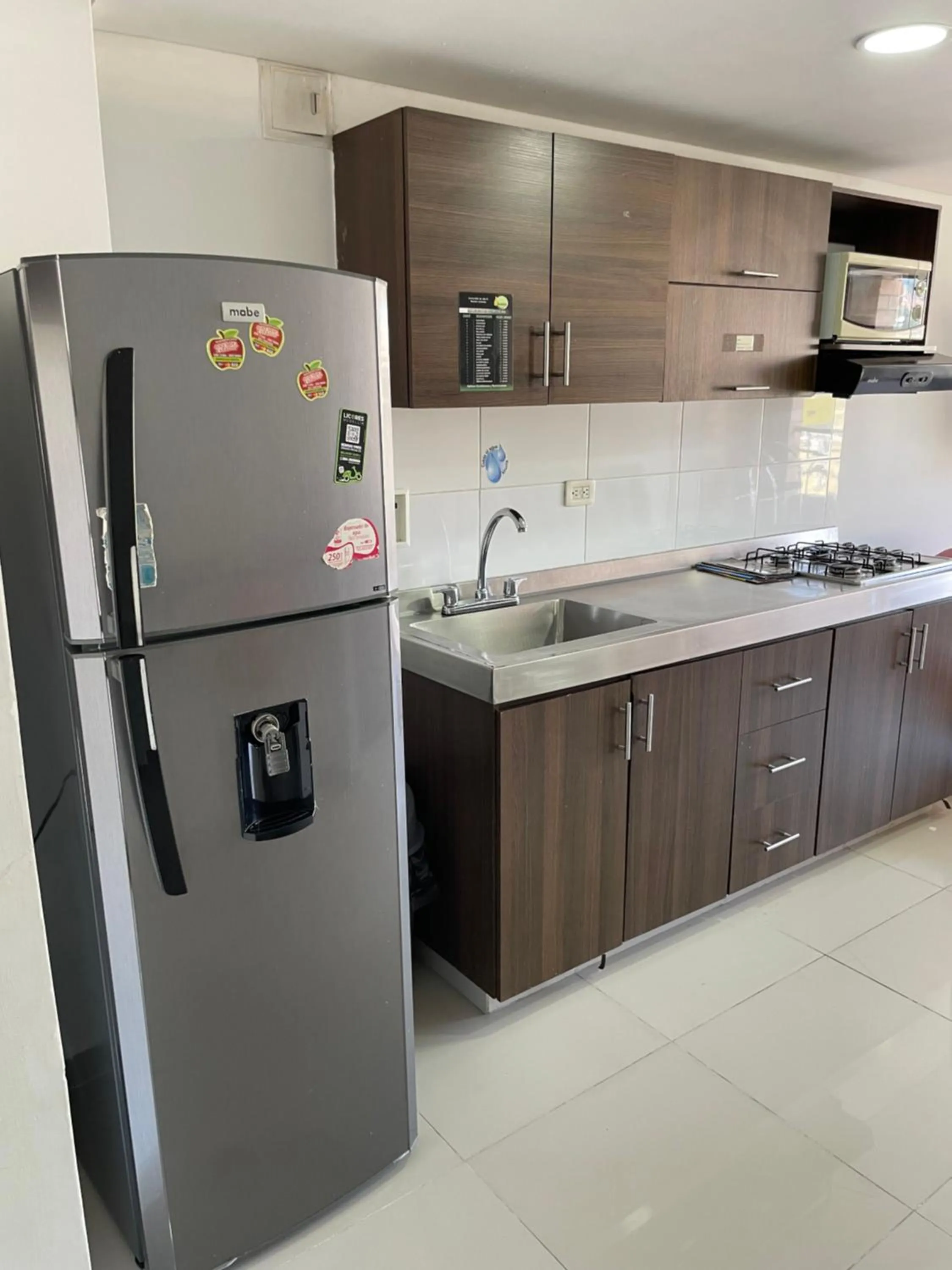 Kitchen or kitchenette in Ivanna Jumar ApartaHotel - Laureles Estadio