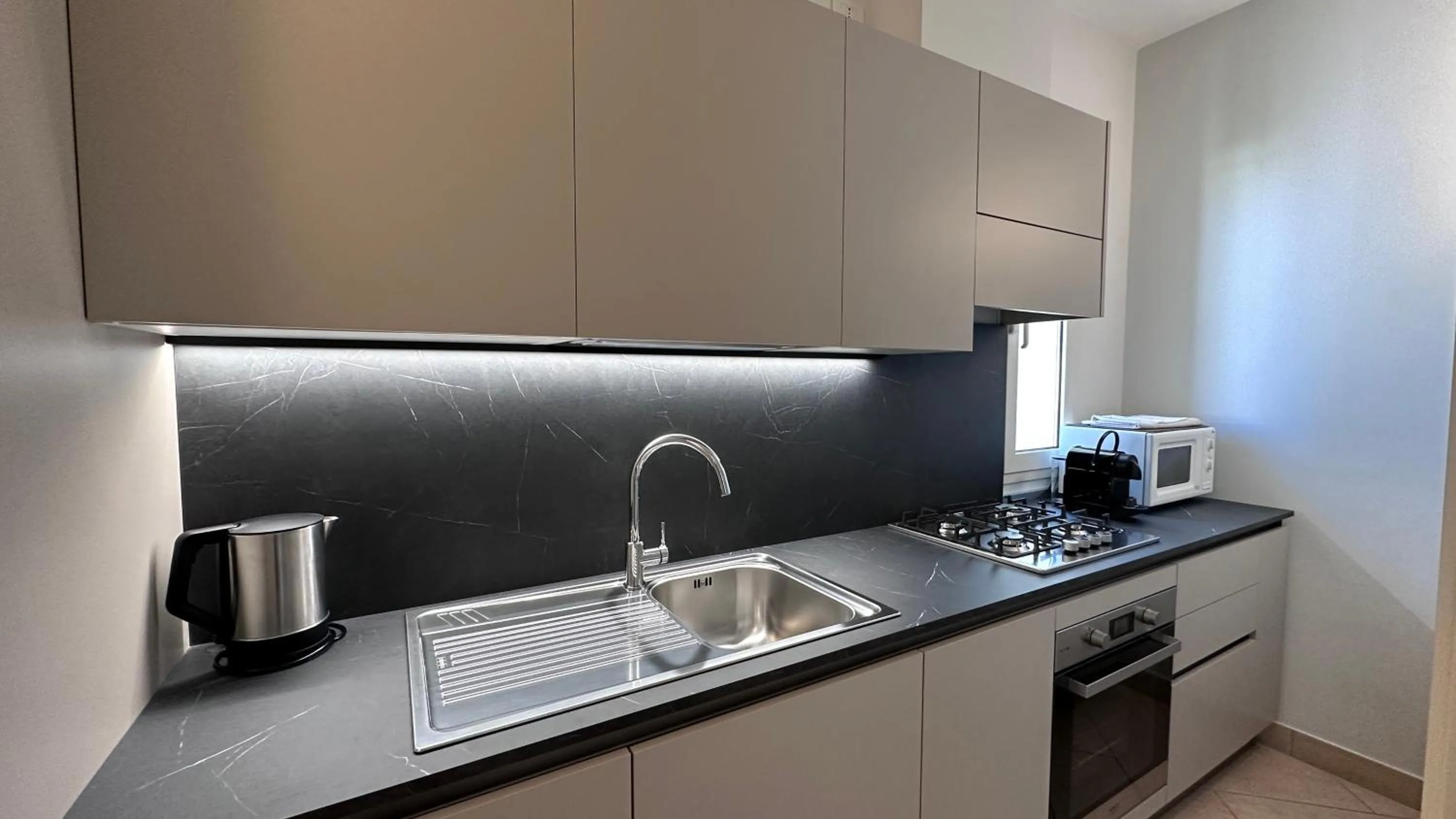 Kitchen or kitchenette in Residence Lungomare - Charming apartments