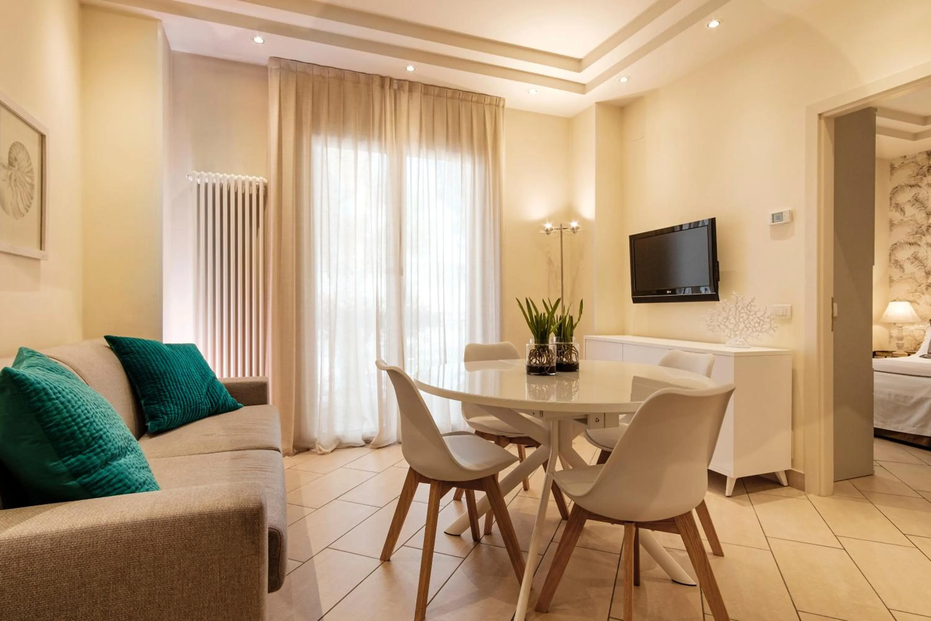 TV and multimedia, Bed in Residence Lungomare - Charming apartments