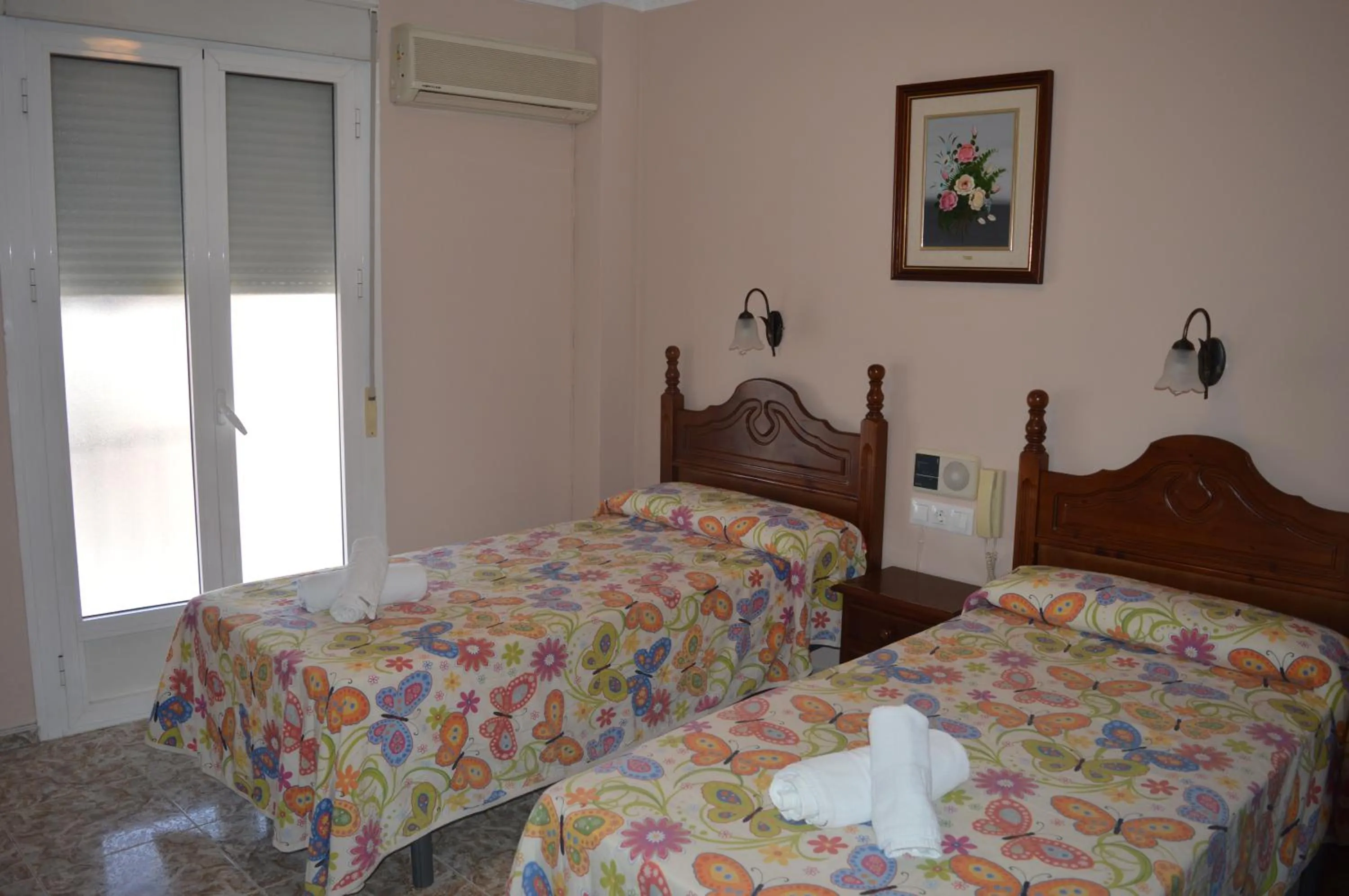 Bed in Hotel Doña Carmen