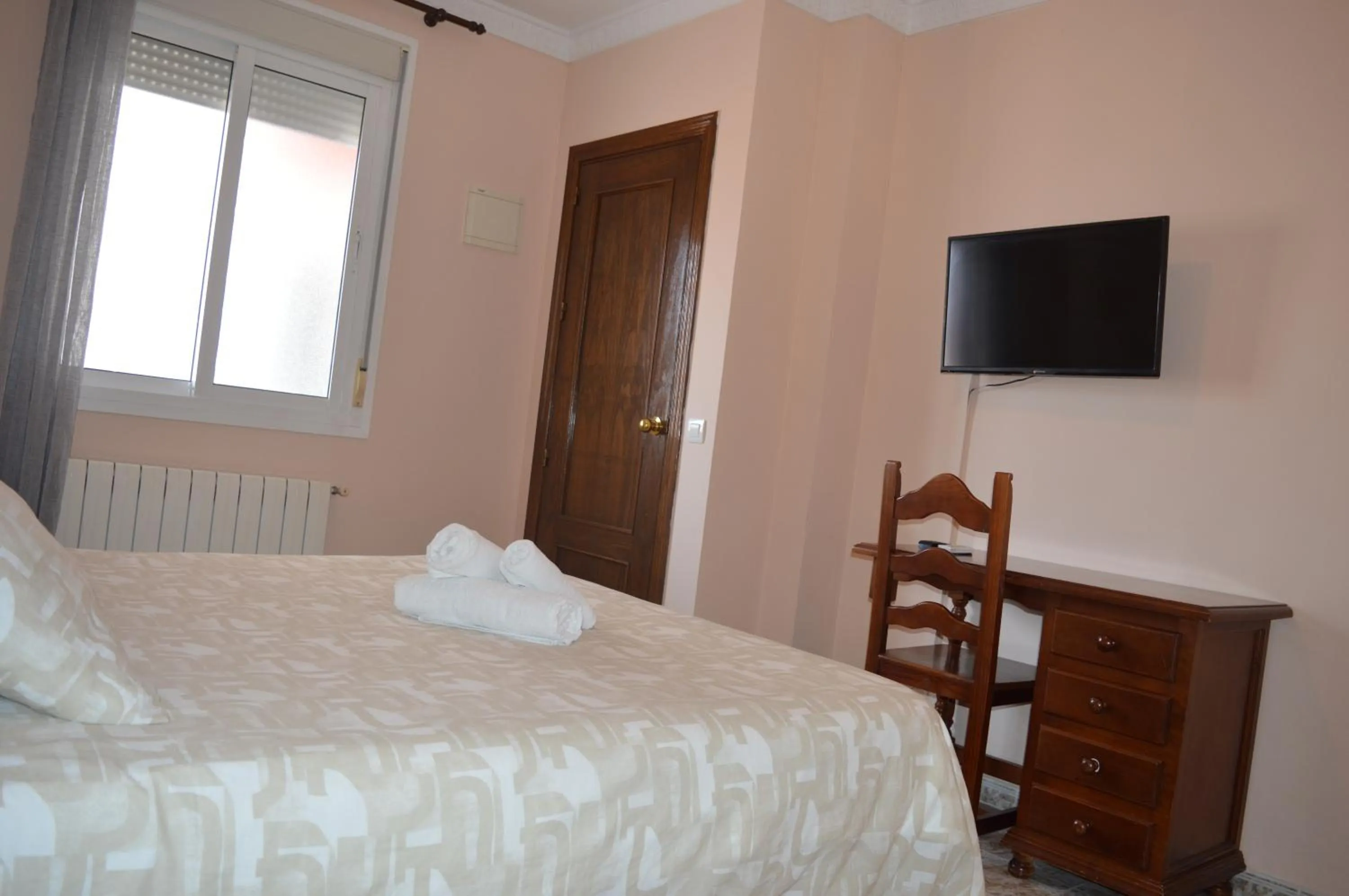 Bed in Hotel Doña Carmen