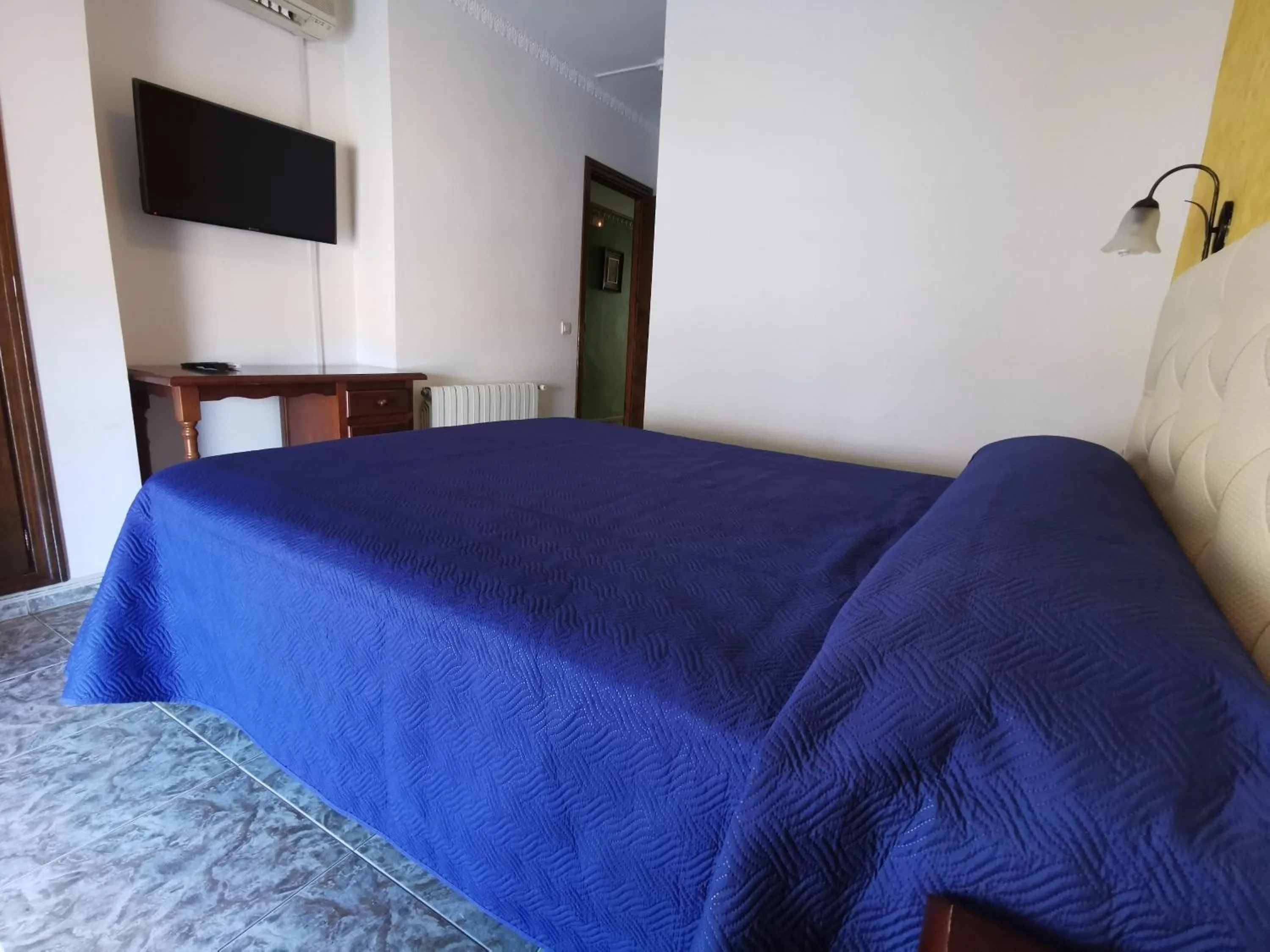 Bed in Hotel Doña Carmen