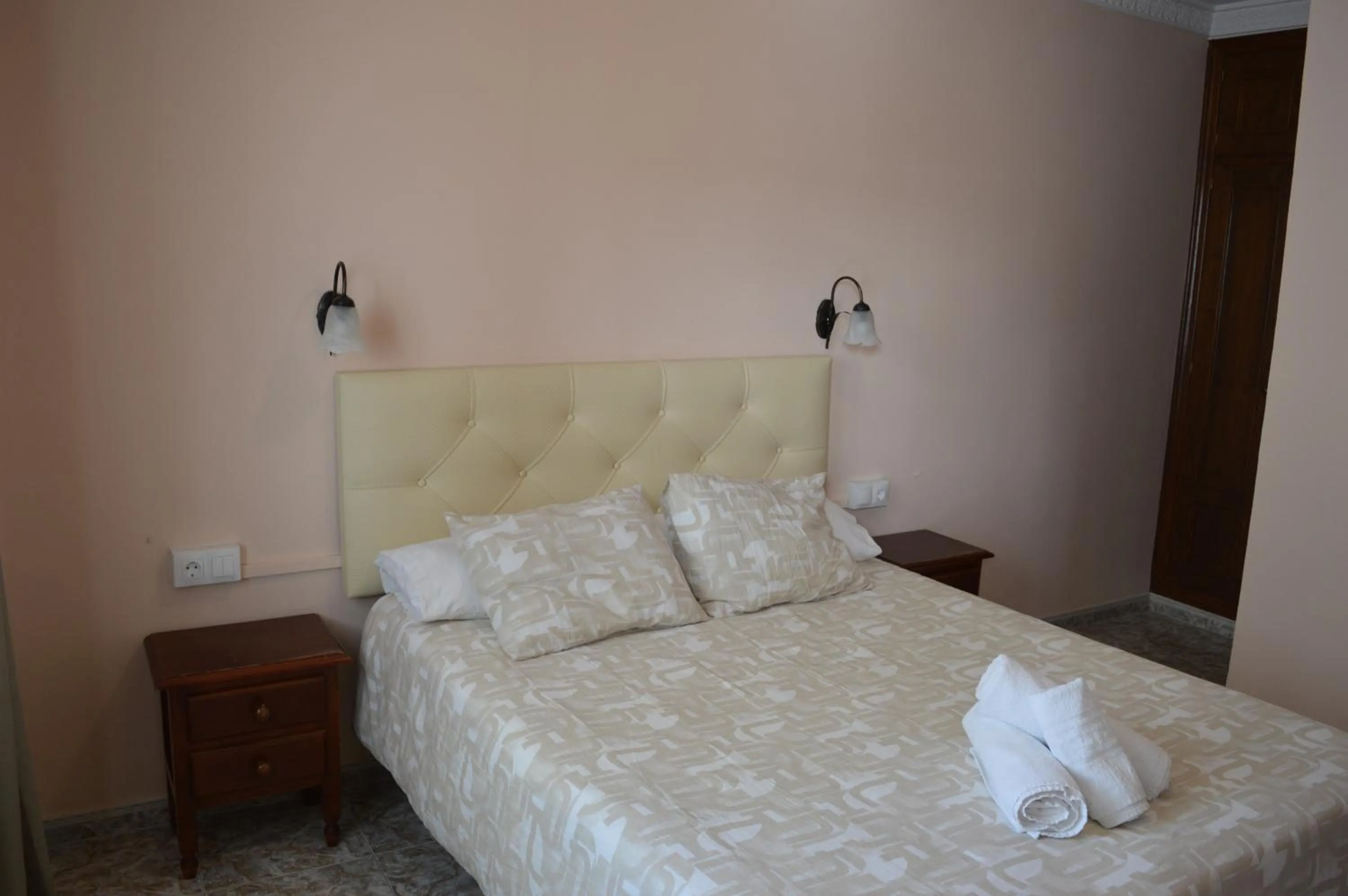 Bed in Hotel Doña Carmen