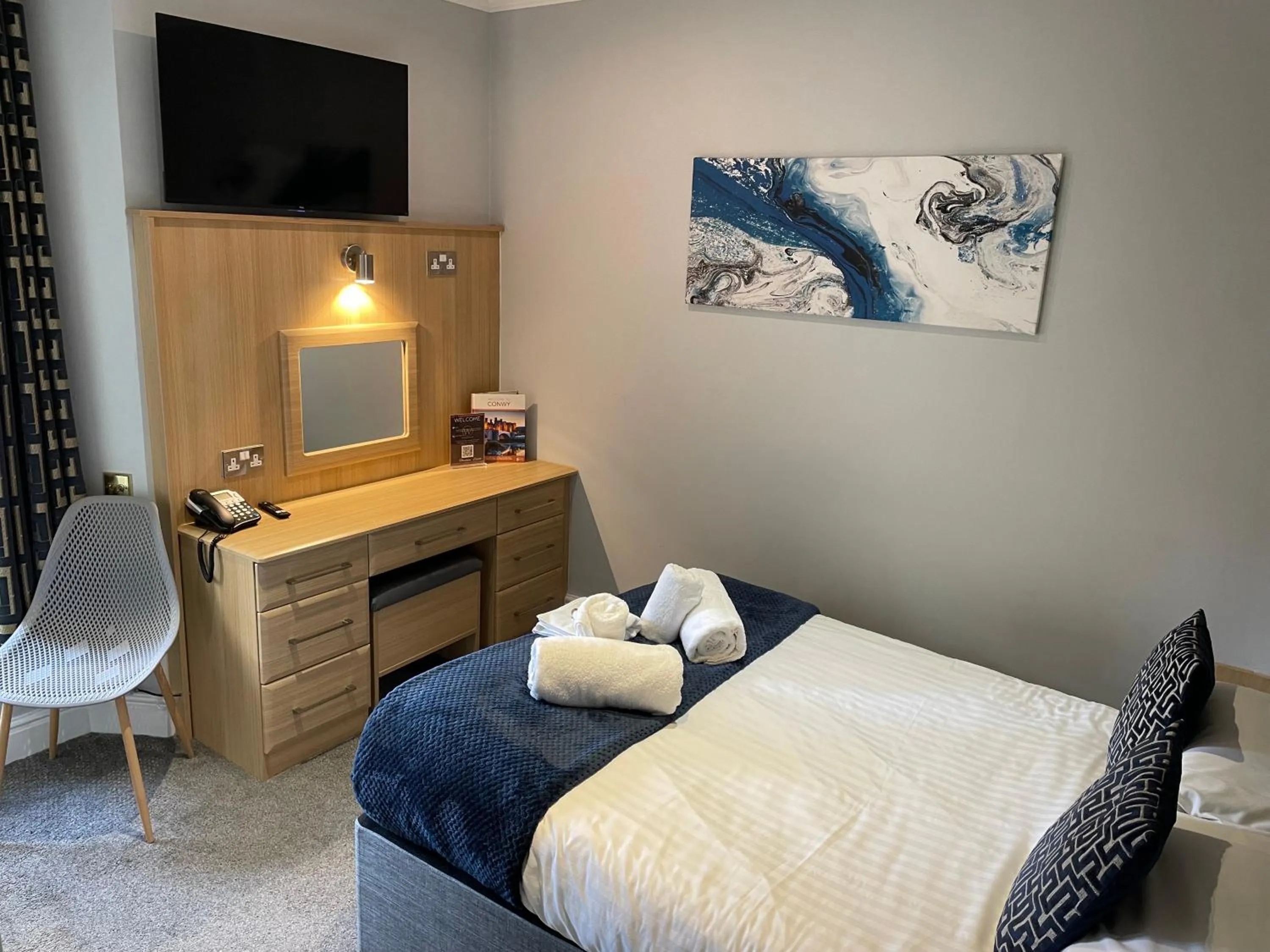 Bed in The Wildings Hotel & Tudno's Restaurant