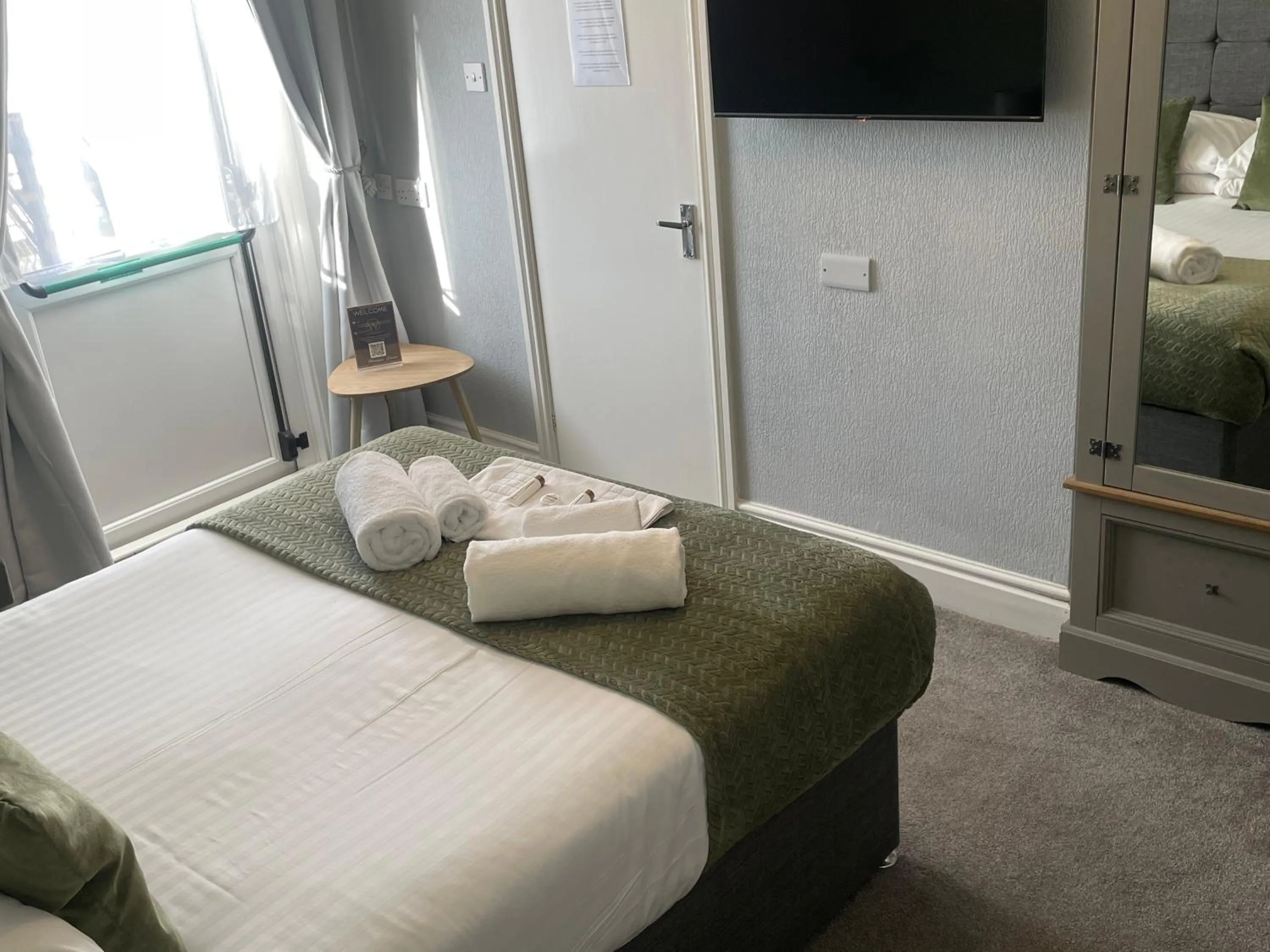 Bed in The Wildings Hotel & Tudno's Restaurant