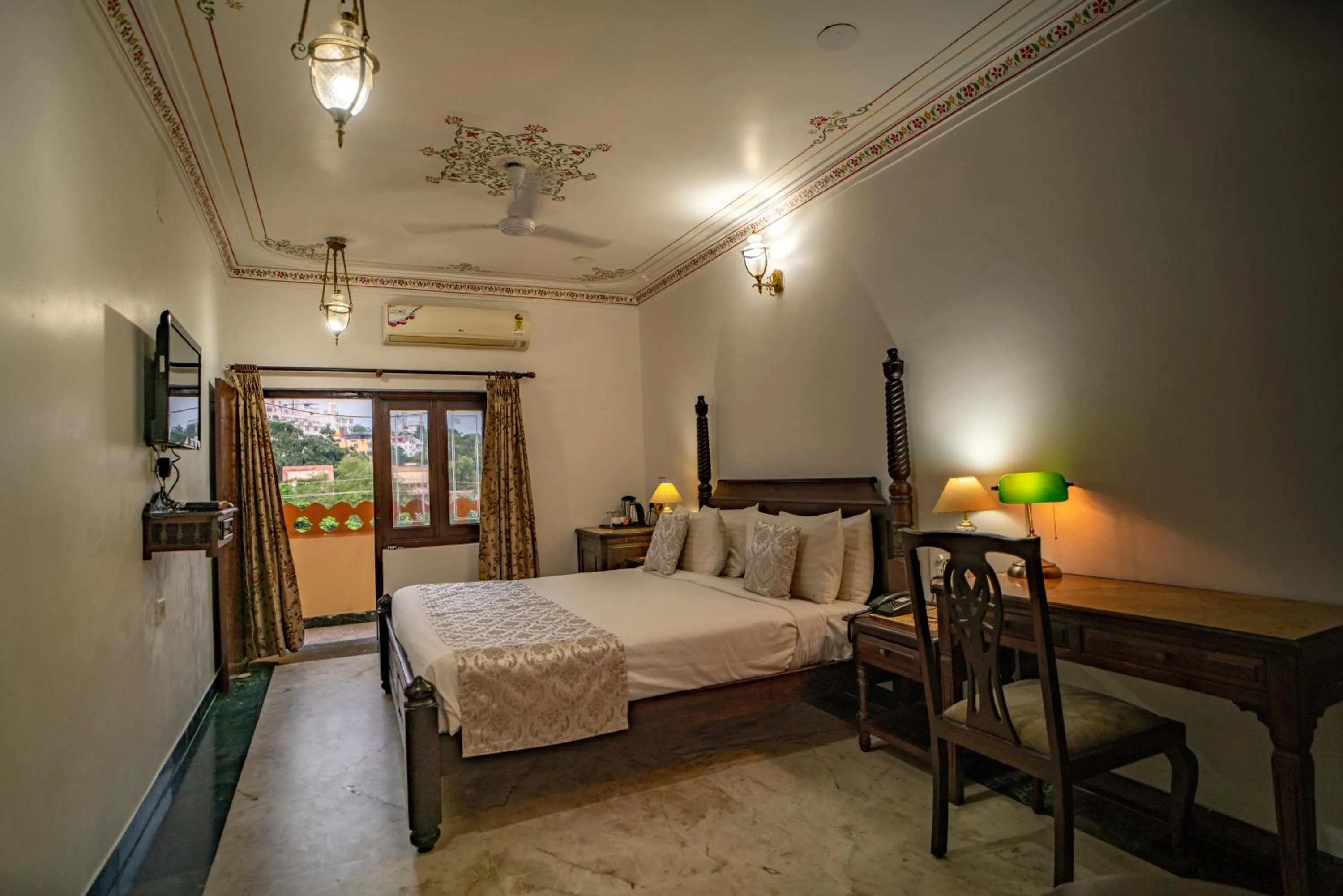 Bed in The Lavitra Lakeview Hotel