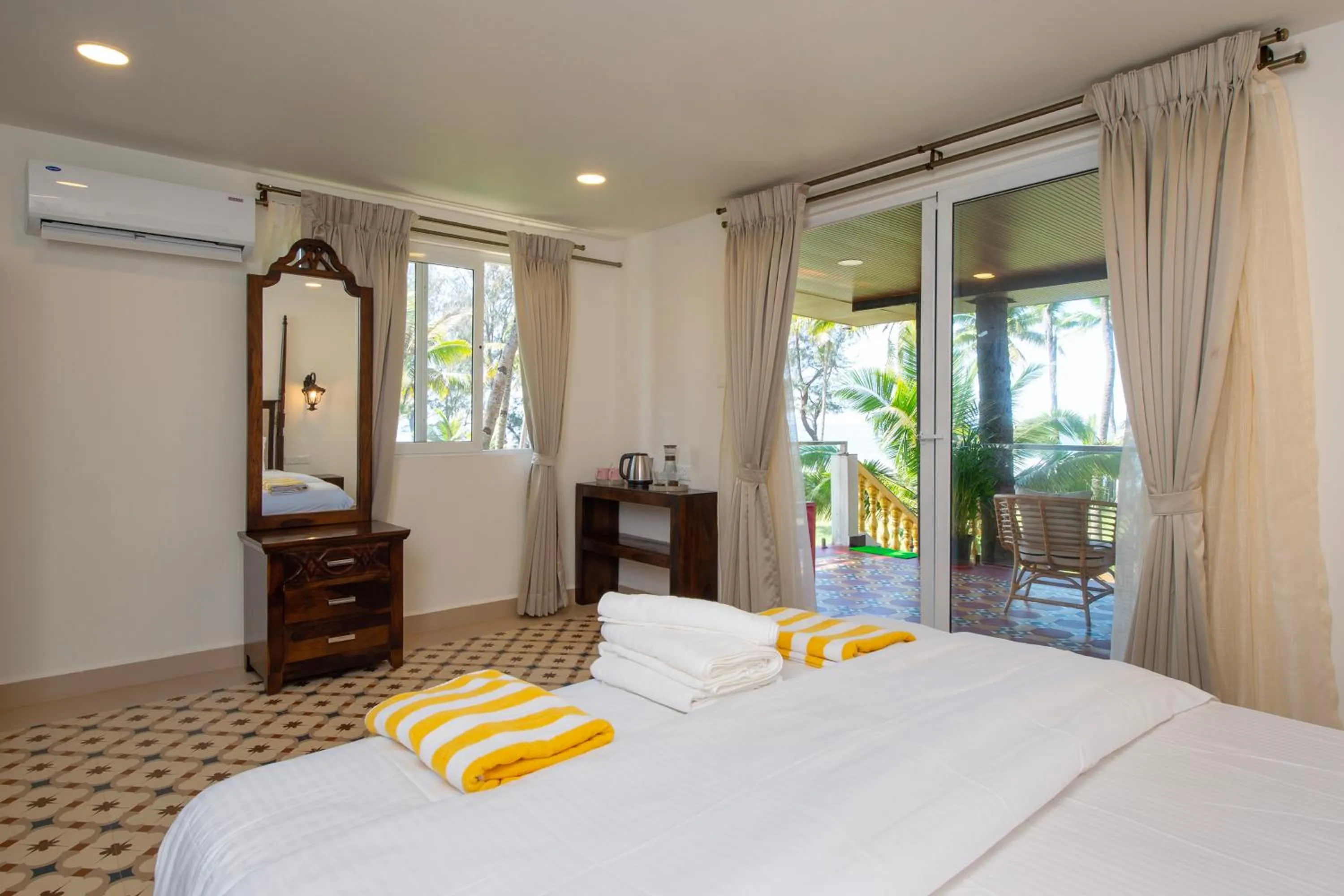 Bed in The Rose Goa Beach Resort