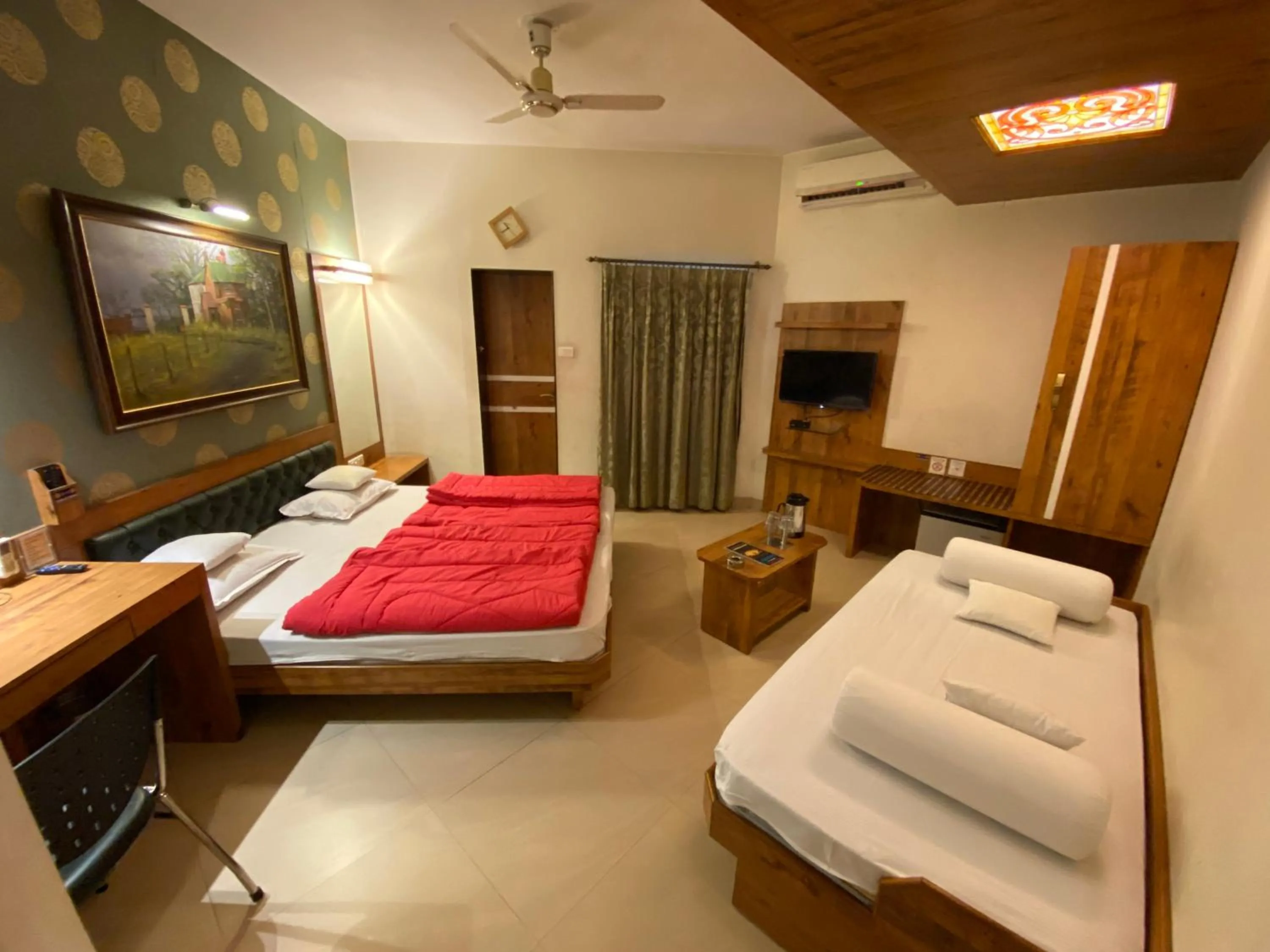Bed in Panchavati Elite Inn