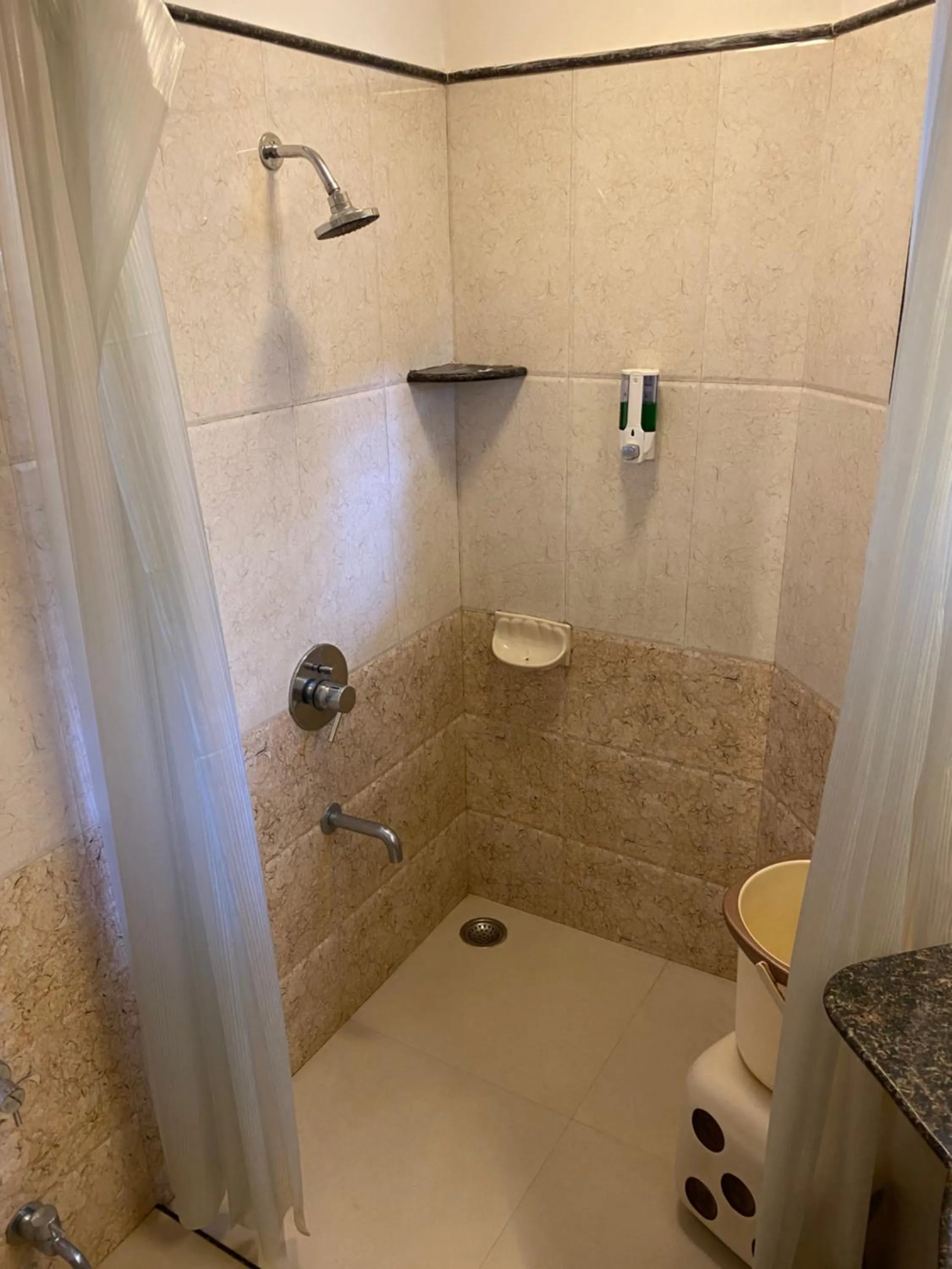 Bathroom in Panchavati Elite Inn