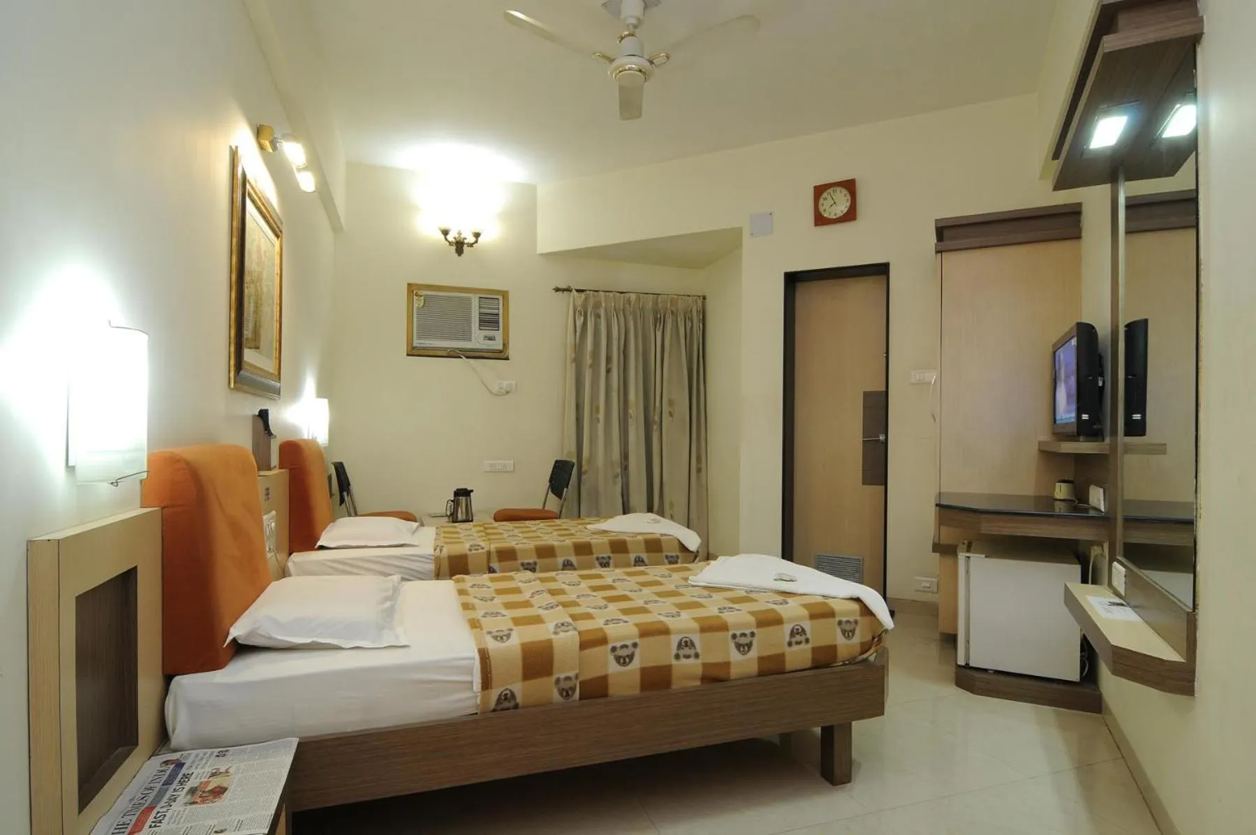 Bed in Panchavati Elite Inn
