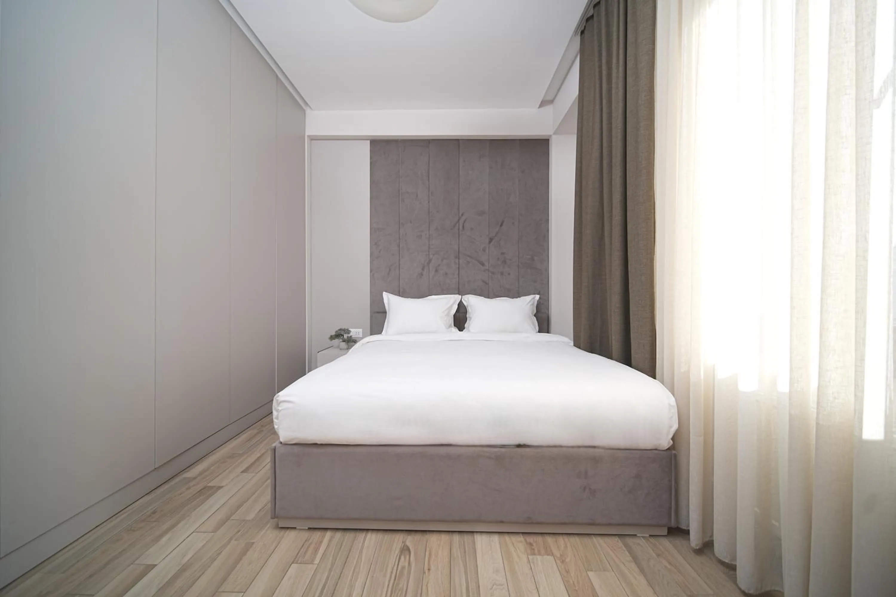 Bed in Sweet Home Deluxe Apart-Hotel